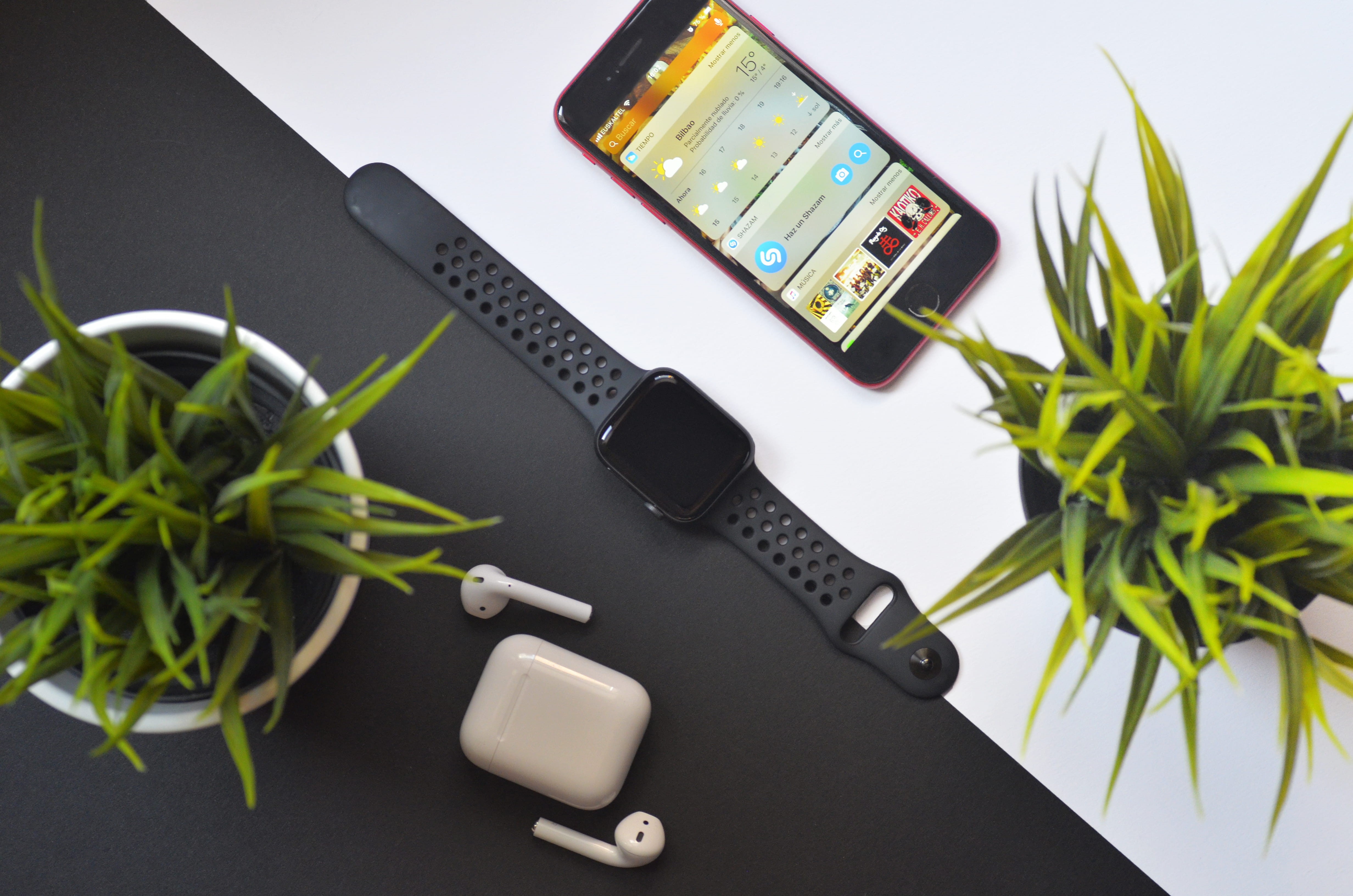 airpods, potted plant, table, apple, mobile phone, computer, indoors, technology, 4K, black color, plant, portable information device, iphone, houseplant, HD Wallpaper