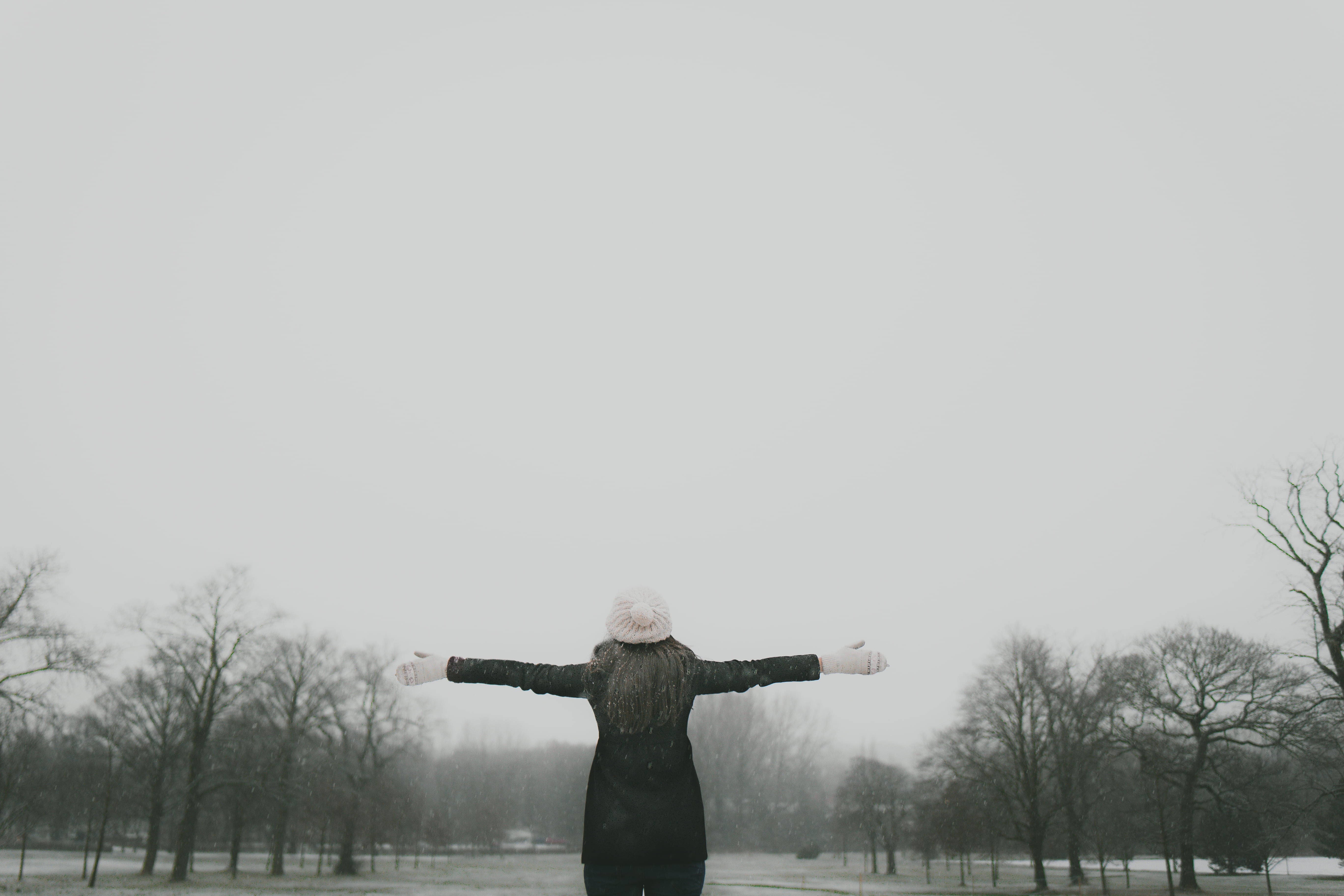 trees, hat, mist, arms raised, front view, outdoors, tree, snow, woman, black, happy, arms outstretched, plant, fog, women, 5K, long, human arm, near, HD Wallpaper