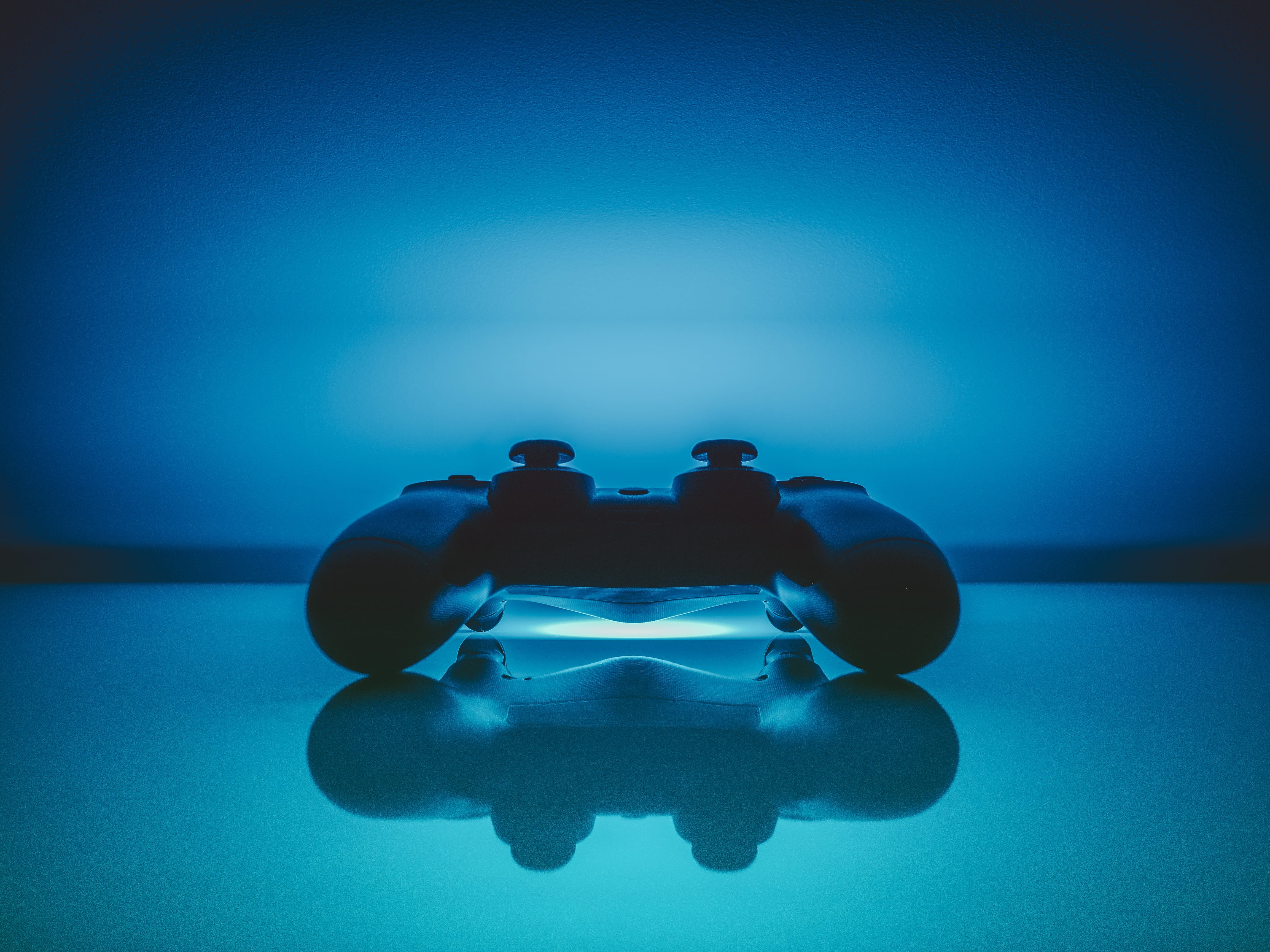 studio shot, digital, dualshock, arts culture and entertainment, sony, blue background, two people, blue, gaming, ps4, gamepad, still life, black, HD Wallpaper