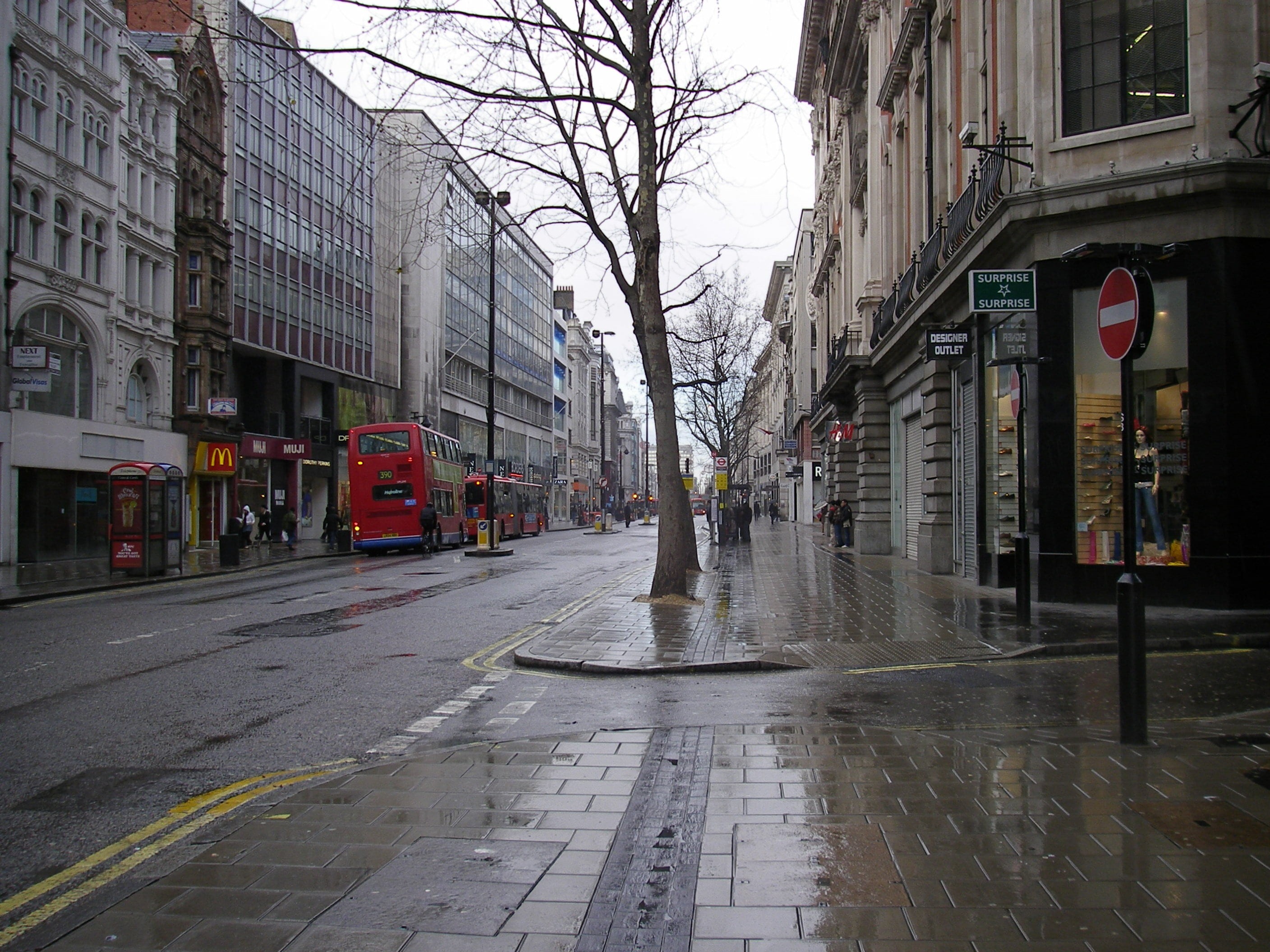 incidental people, city street, buildings, sign, outdoors, uk, day, bare tree, city, road, rain, architecture, wet, london, urban, building exterior, building, HD Wallpaper