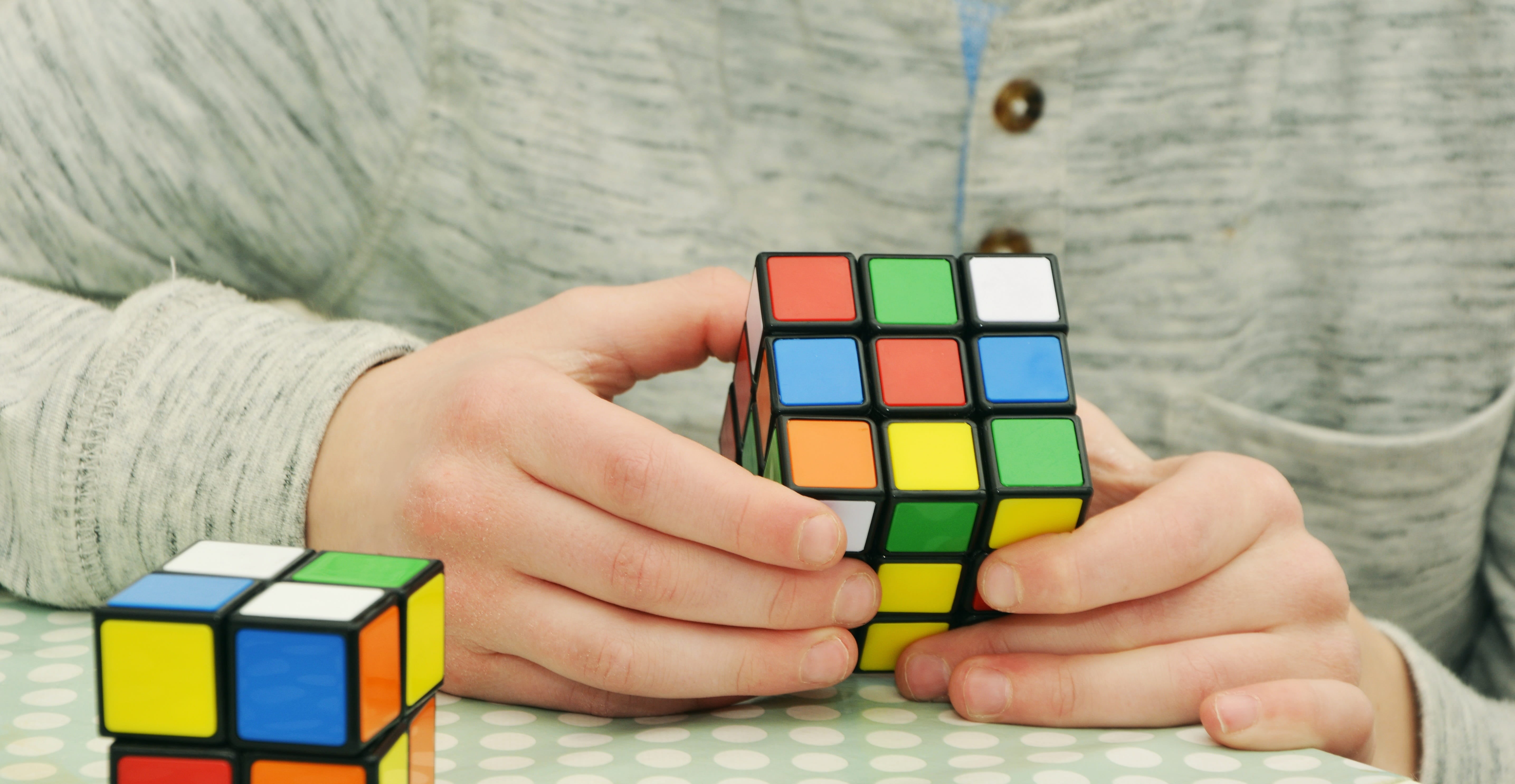 leisure activity, indoors, hand, tricky, colorful, one person, relaxation, toy, wood - material, adult, play, hobby, puzzle, close-up, only men, leisure games, HD Wallpaper