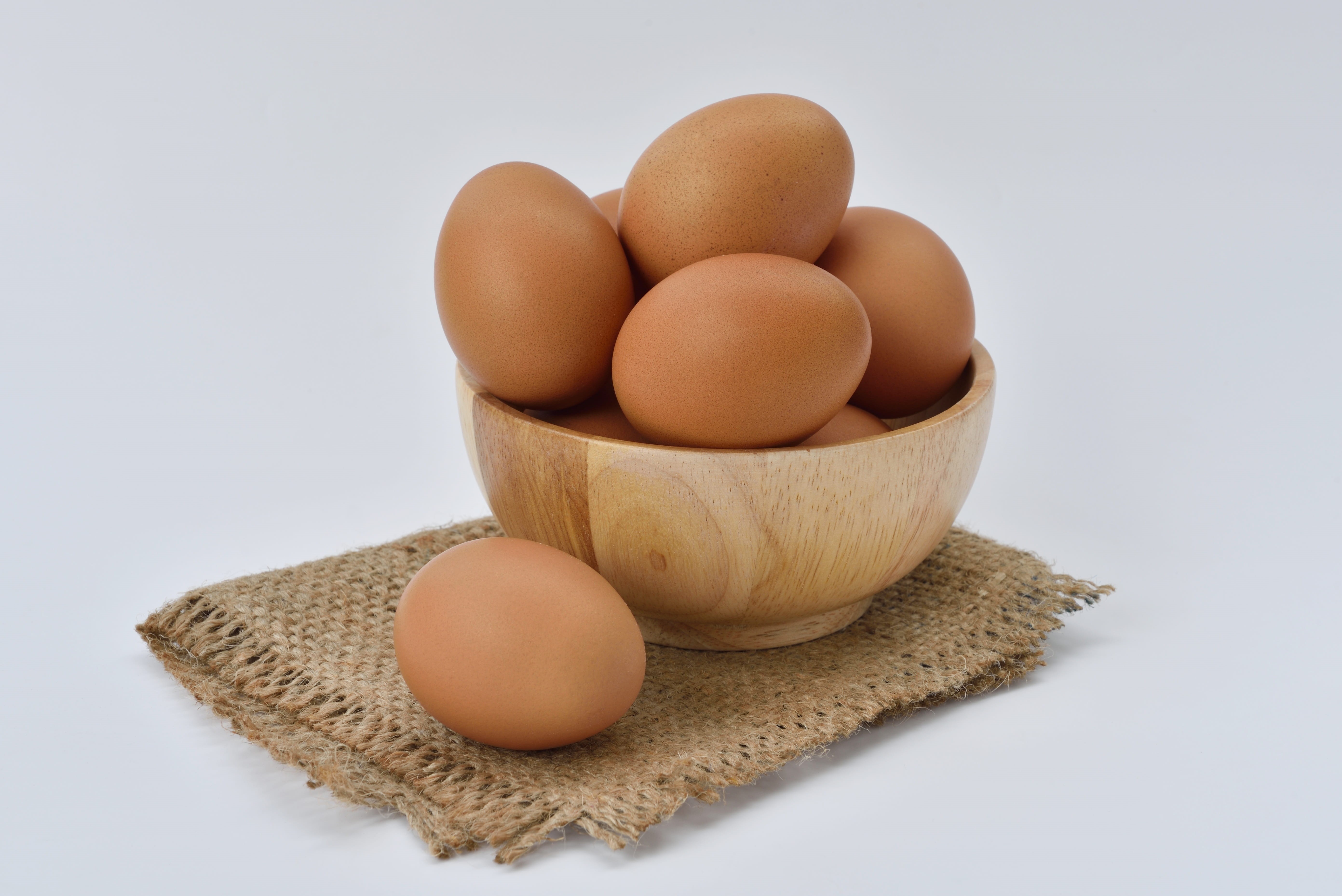 still life, 5K, organic, close-up, wood - material, studio shot, brown egg, eggshell, raw, bowl, brown, white background, protein, simple, eggs, raw food, HD Wallpaper