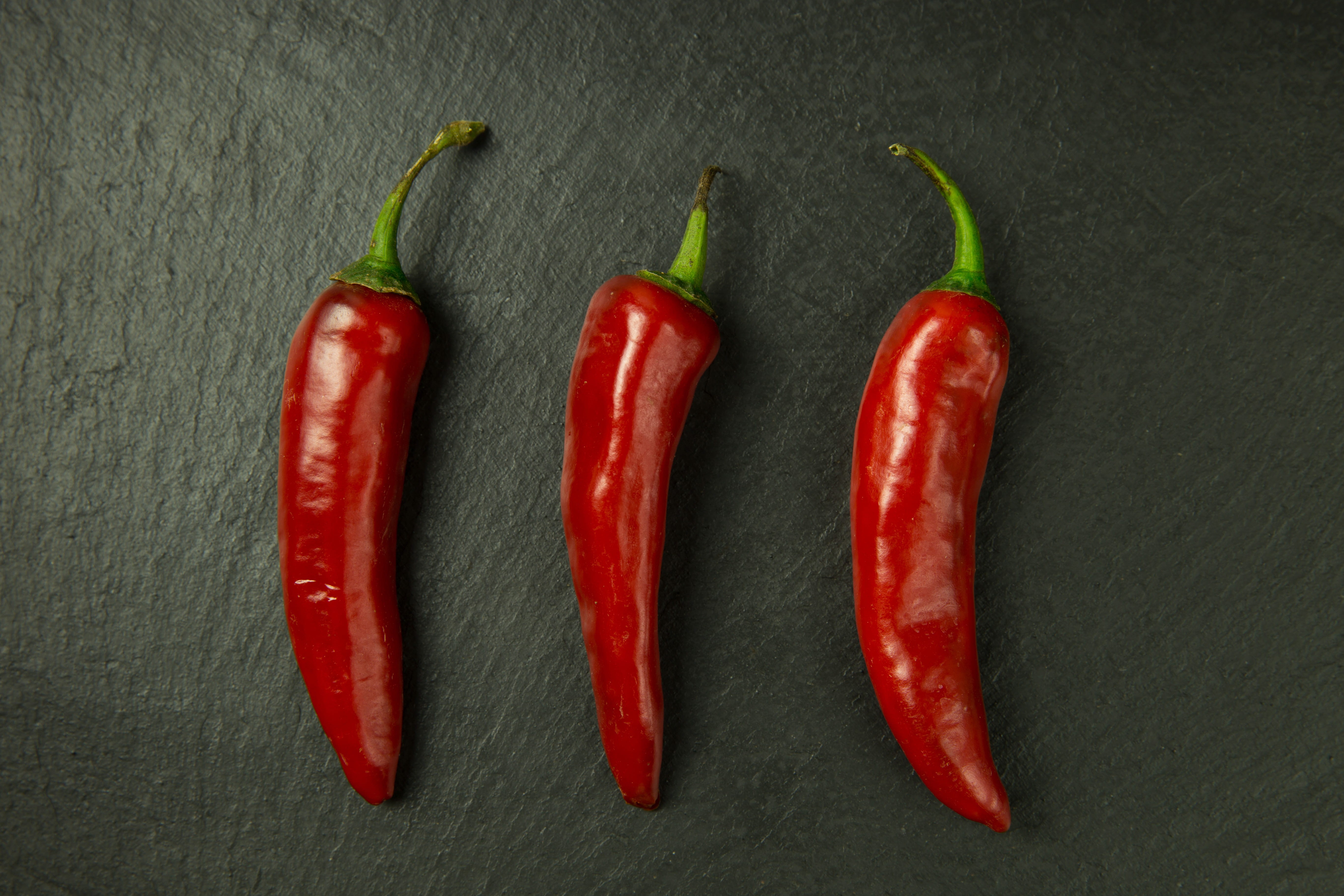 pepper, indoors, organic, freshness, seasoning, food And Drink, raw Food, black background, Red Hot Chilli Peppers, color Image, directly above, cooking, HD Wallpaper
