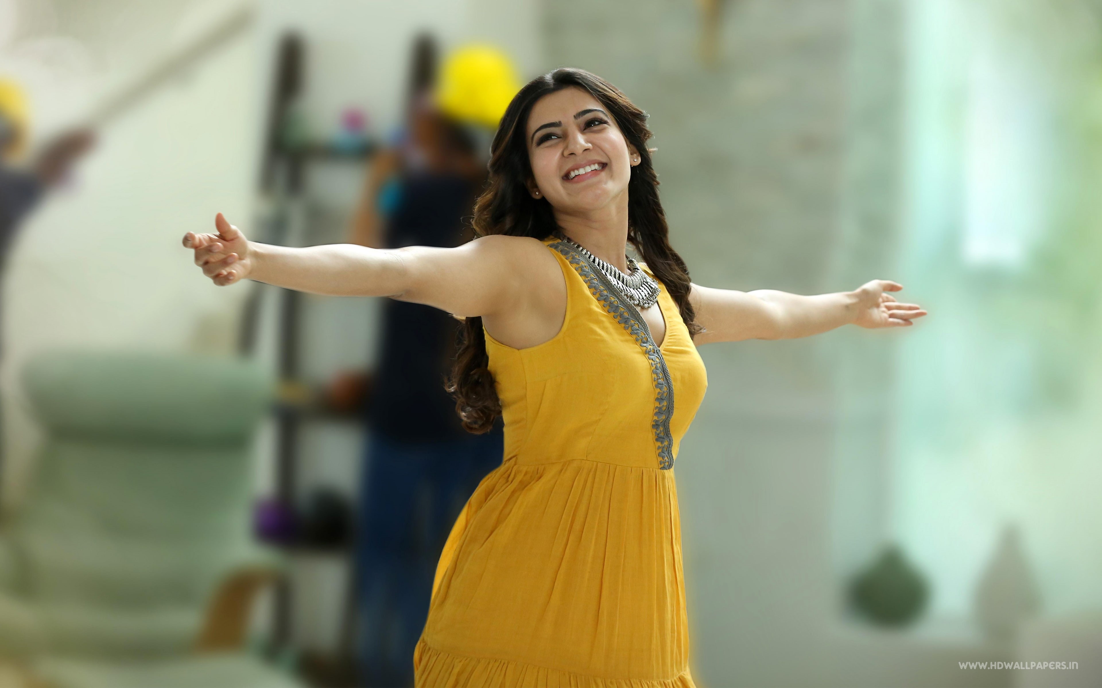 one person, dancing, arms raised, women, standing, human limb, happiness, human arm, arms outstretched, long hair, yellow, beautiful woman, smiling, hair, HD Wallpaper
