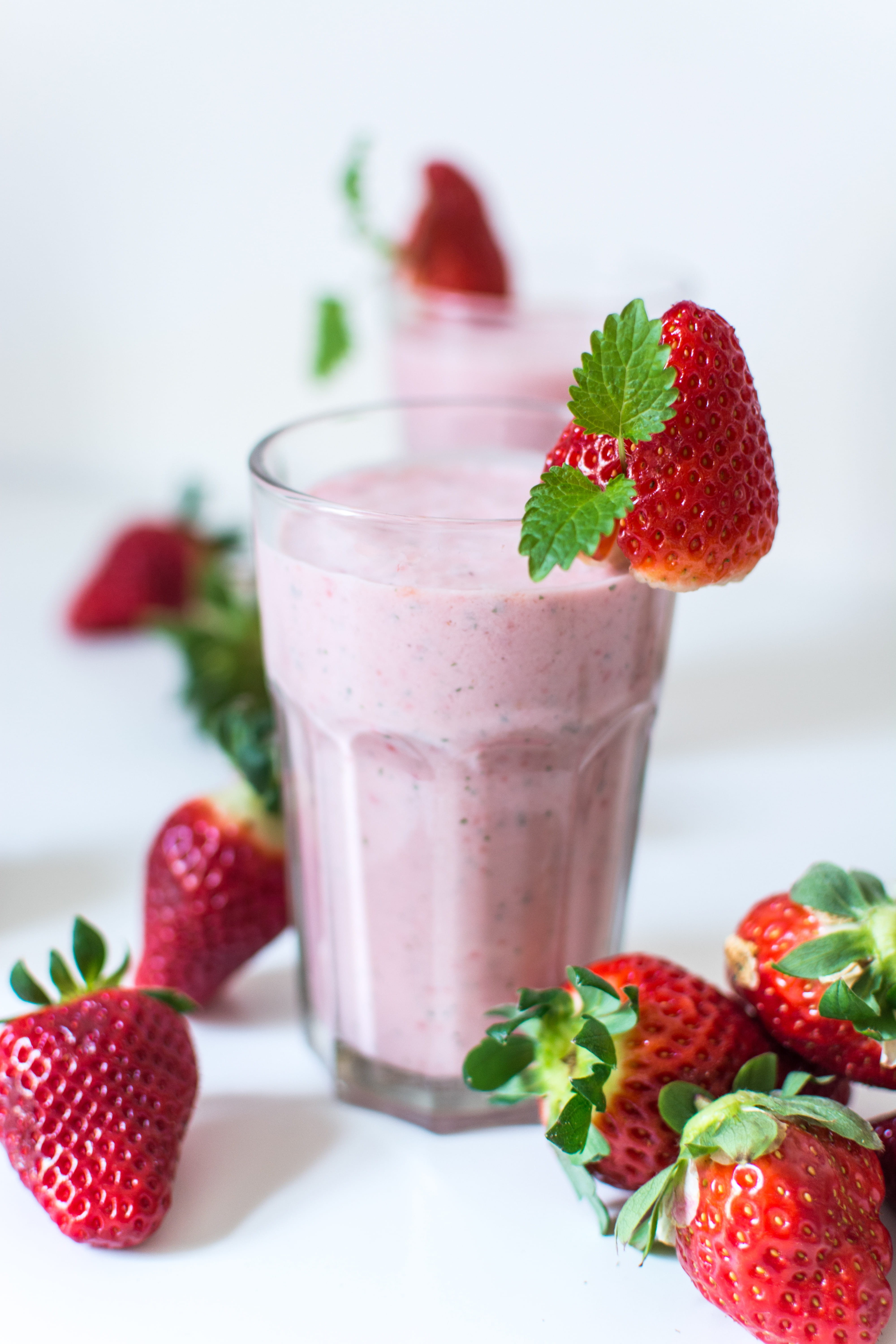 gourmet, milkshake, close up, raspberry, healthy Eating, household equipment, colorful, herb, ripe, table, breakfast, milk, leaf, white background, food, Phone HD Wallpaper