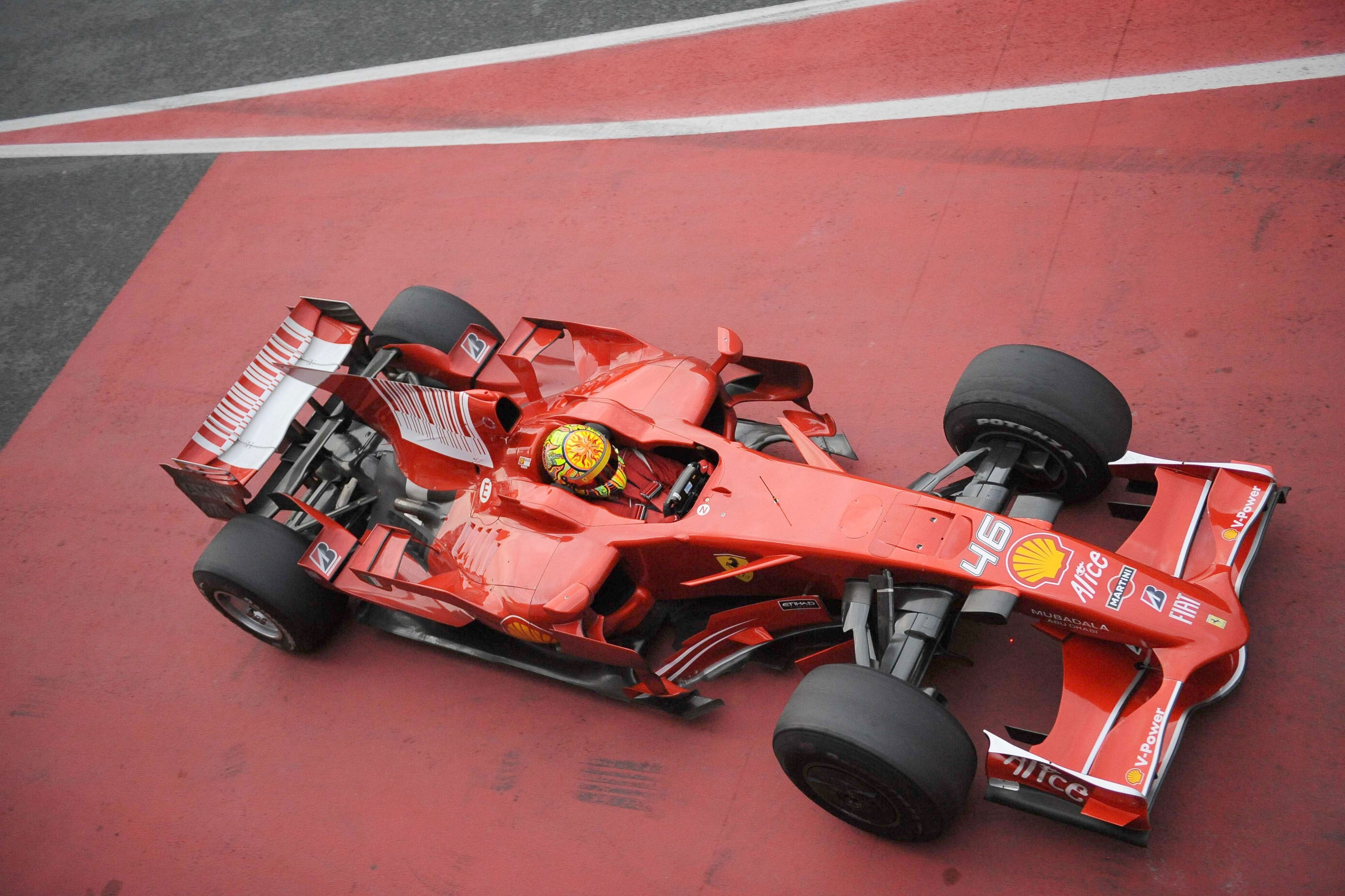 black, helmet, competitive sport, Formula 1, land vehicle, no people, car, accidents and disasters, rc, day, Ferrari, competition, outdoors, high angle view, HD Wallpaper