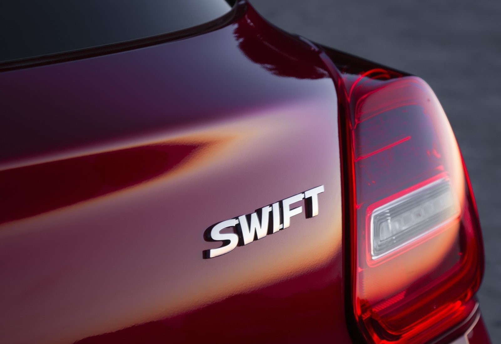 studio shot, swift, communication, land vehicle, focus on foreground, 720P, reflection, high angle view, red, no people, car, suzuki, motor vehicle, mode of transportation, HD Wallpaper
