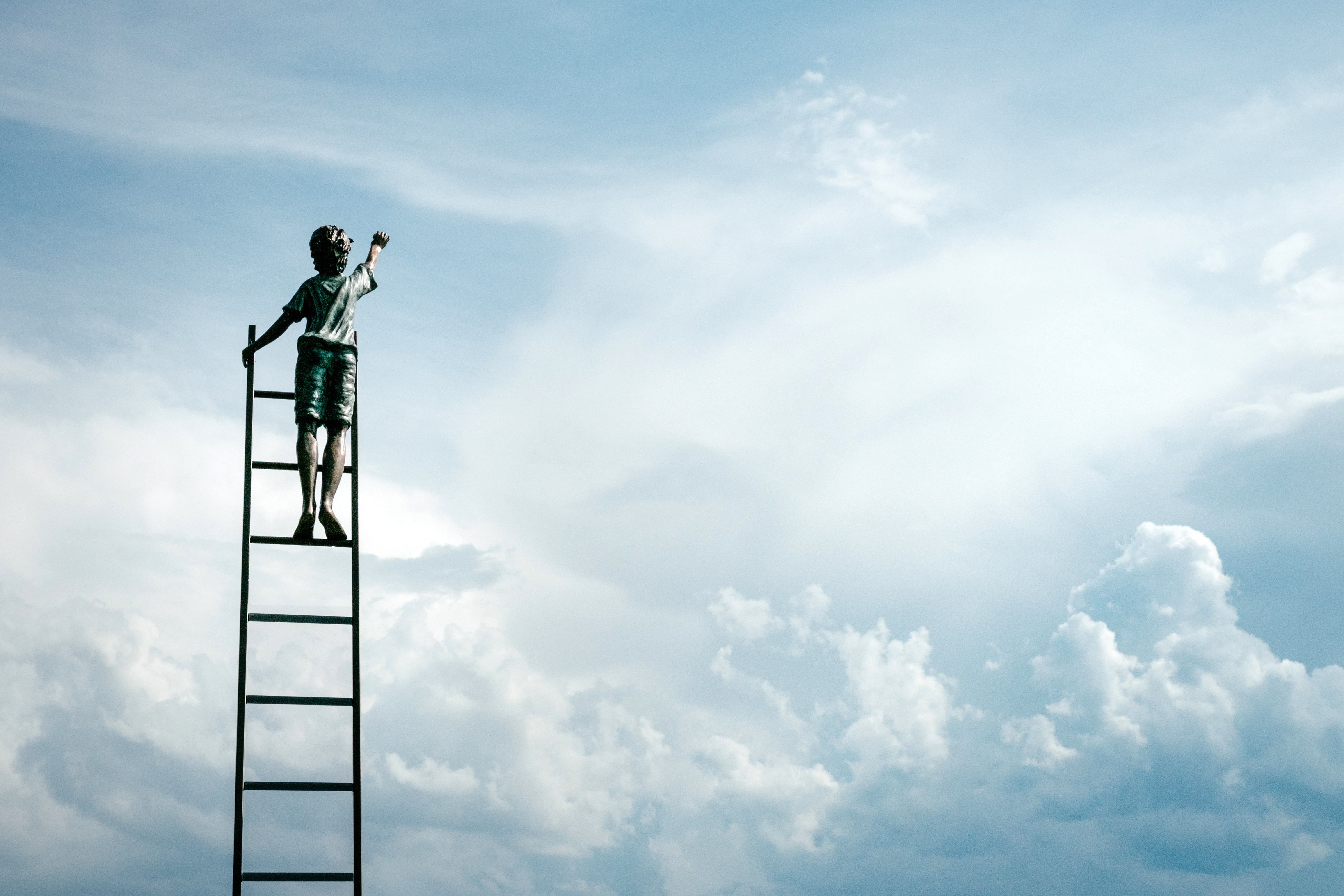 black, boy, casual clothing, sculpture, day, outdoors, climbing, blue, real people, cloud - sky, 5K, observation point, standing, beauty in nature, communication, HD Wallpaper