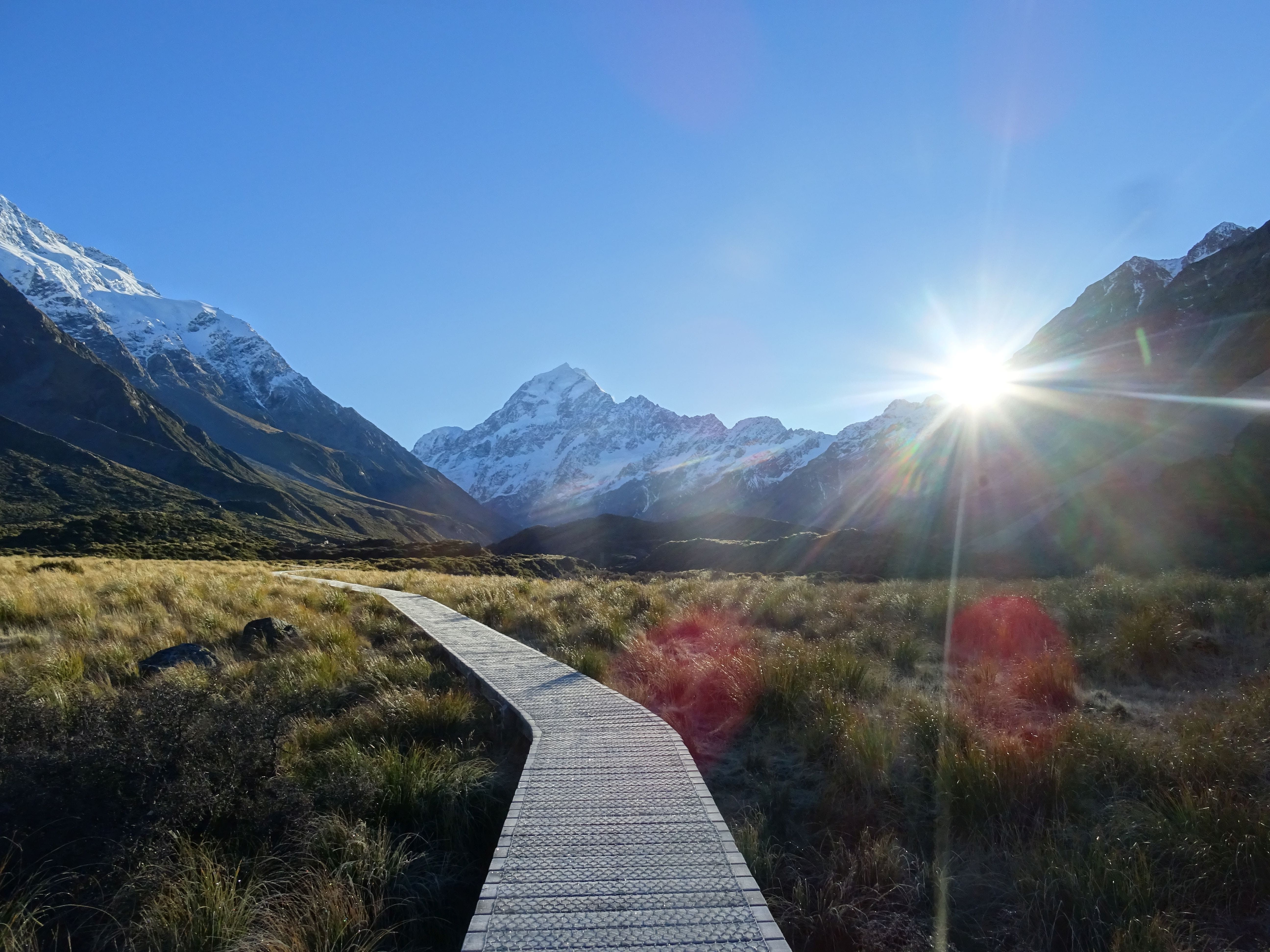beauty in nature, lens flare, sky, nature, sunbeam, mountain range, 5K, landscape, sun, path, aoraki/mount cook national park, environment, sunlight, no people, HD Wallpaper