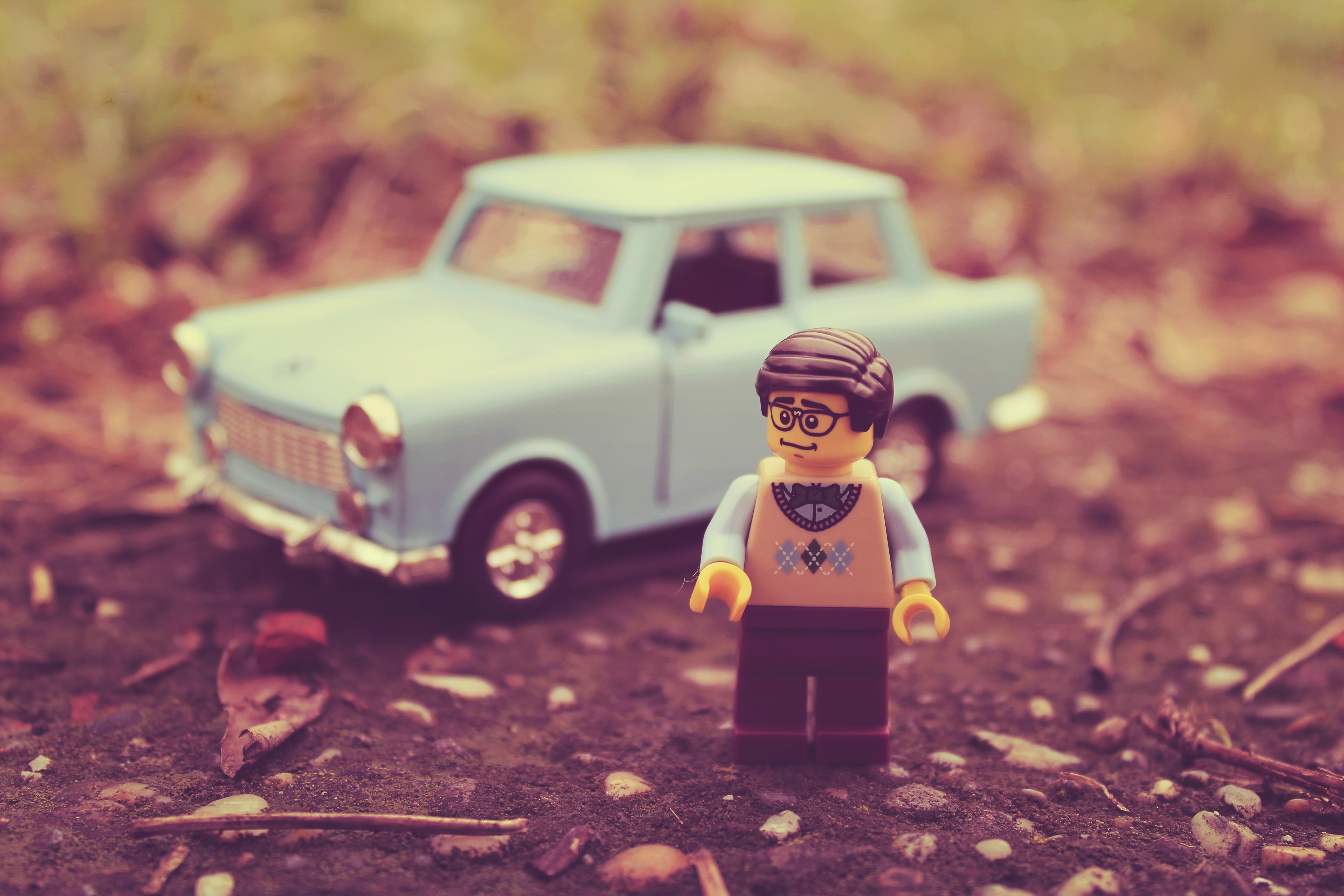 focus on foreground, real people, man, toys, toy, vintage, LEGO, land, DDR, child, males, miniatures, change, boys, childhood, figurines, outdoors, nature, HD Wallpaper