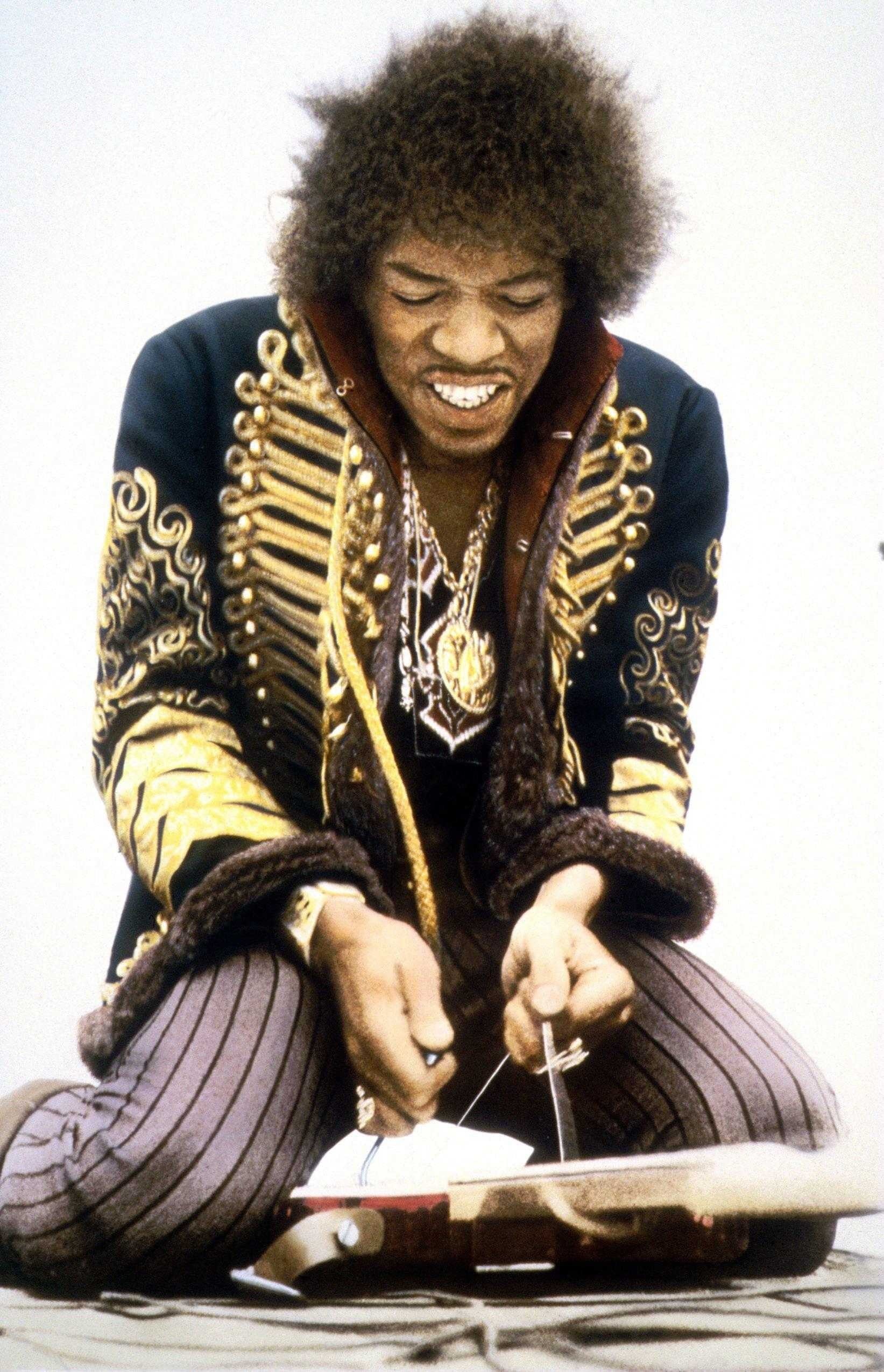 three quarter length, men, hairstyle, adult, front view, music, drugs, Jimi Hendrix, portrait, 1080P, smiling, cheerful, holding, sitting, curly hair, Phone HD Wallpaper