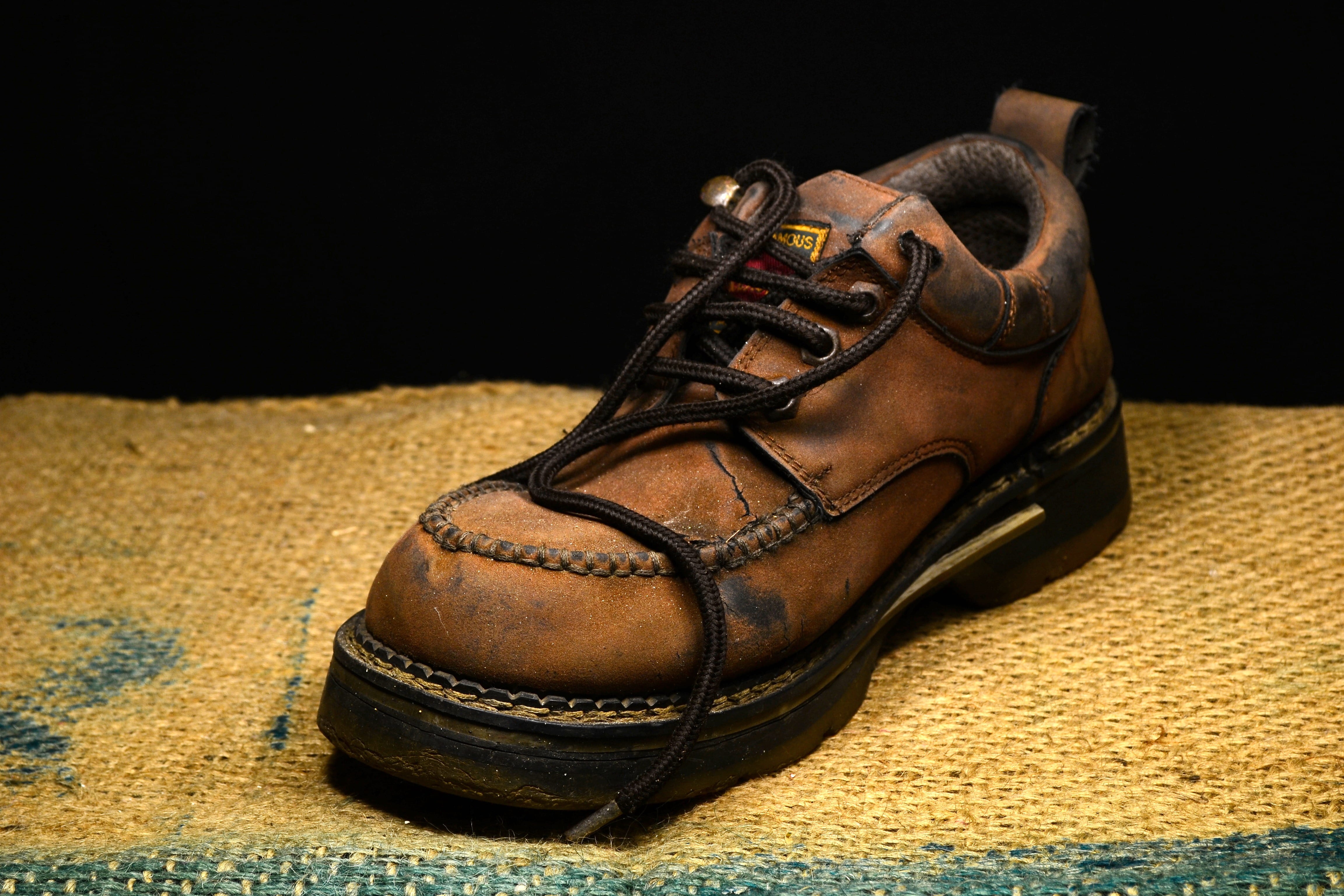 studio shot, flooring, boot, no people, single object, black background, shoe, brown, shoestrings, unpaired, dirty, indoors, cracked, sri lanka, work, bootlaces, HD Wallpaper