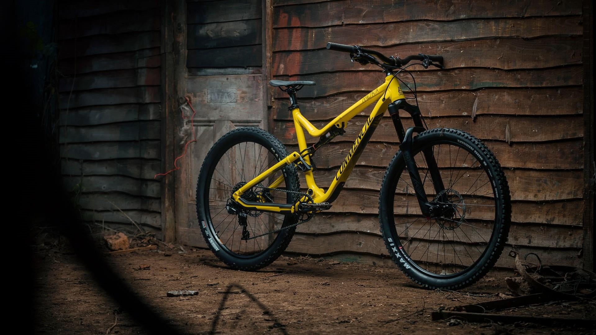 outdoors, wall, garage, land vehicle, day, wall - building feature, bike, mode of transportation, architecture, commencal, wheel, 1080P, yellow, building exterior, HD Wallpaper