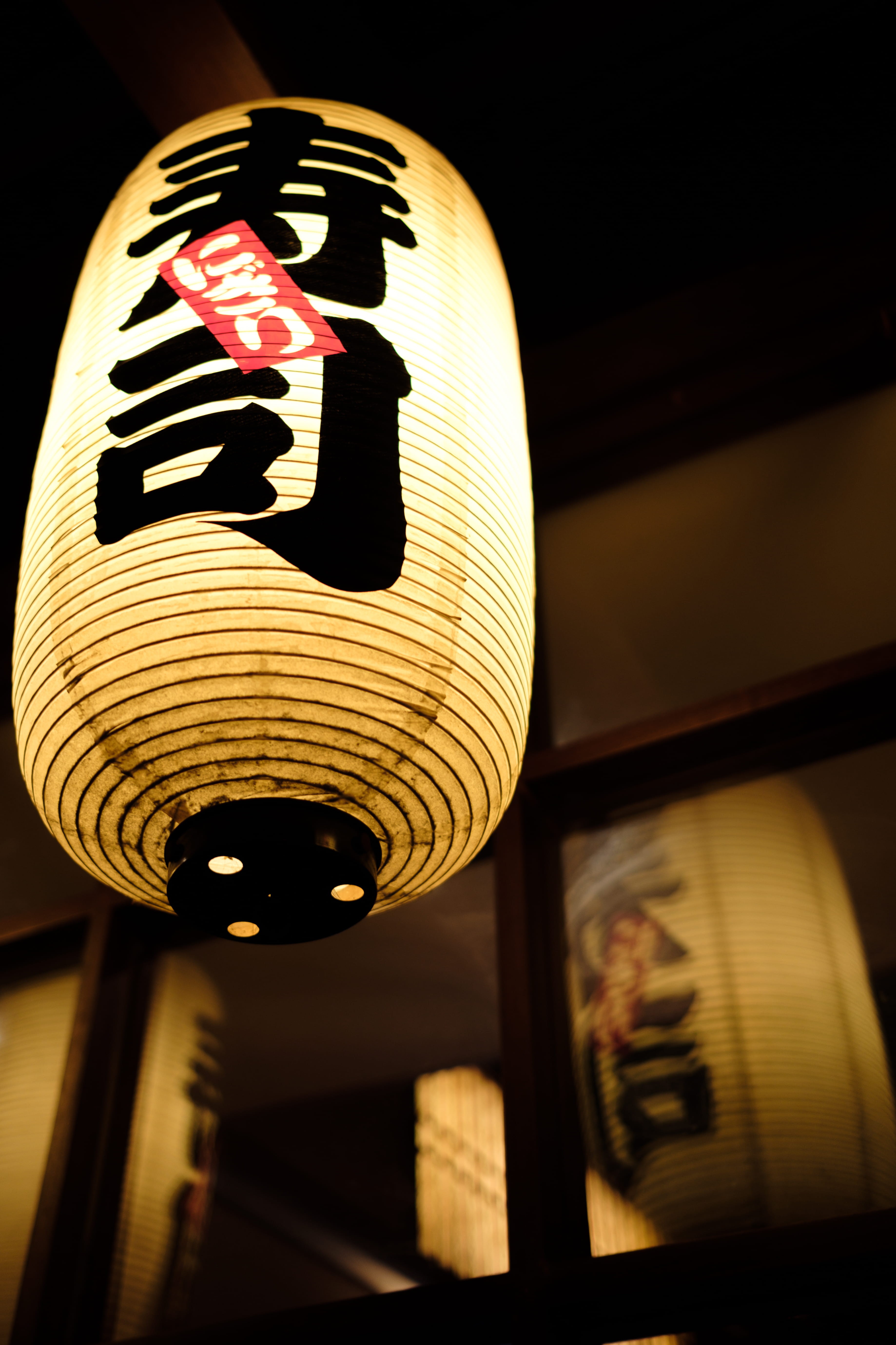 lamp, printed, paper lantern, asia, human representation, japanese Culture, 5K, turned, text, illuminated, paper, script, lighting Equipment, built structure, Phone HD Wallpaper
