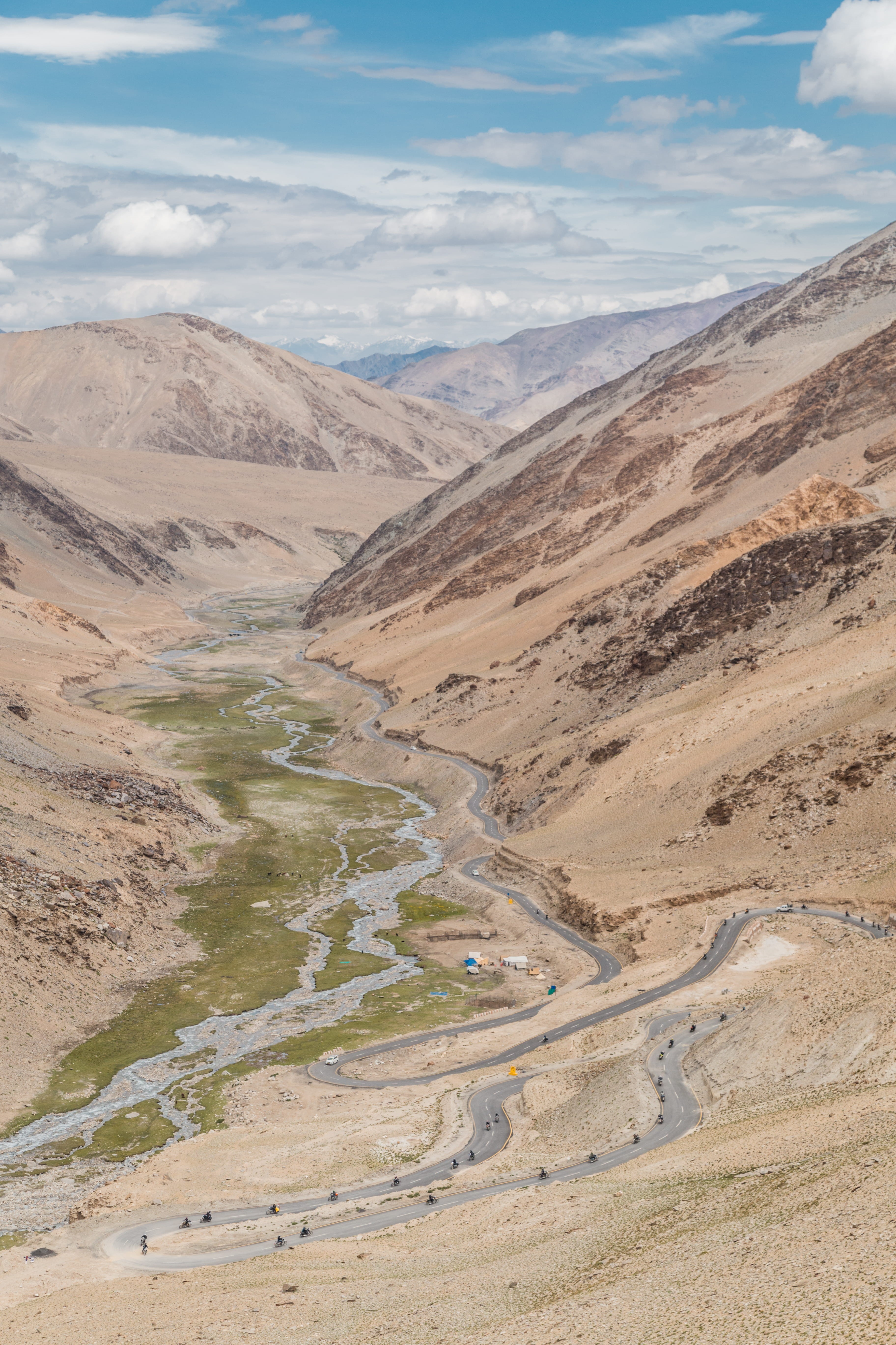 gravel, cloud - sky, royal enfield, scenery, canyon, climate, non-urban scene, day, ride more, land, tranquility, pure motorcycling, mountain, mountain range, Phone HD Wallpaper