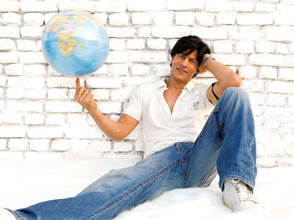 Bollywood Celebrities, jeans, one person, smiling, super star, 480P, shirt, bollywood, khan, happiness, day, emotion, females, white, architecture, shahrukh khan, HD Wallpaper