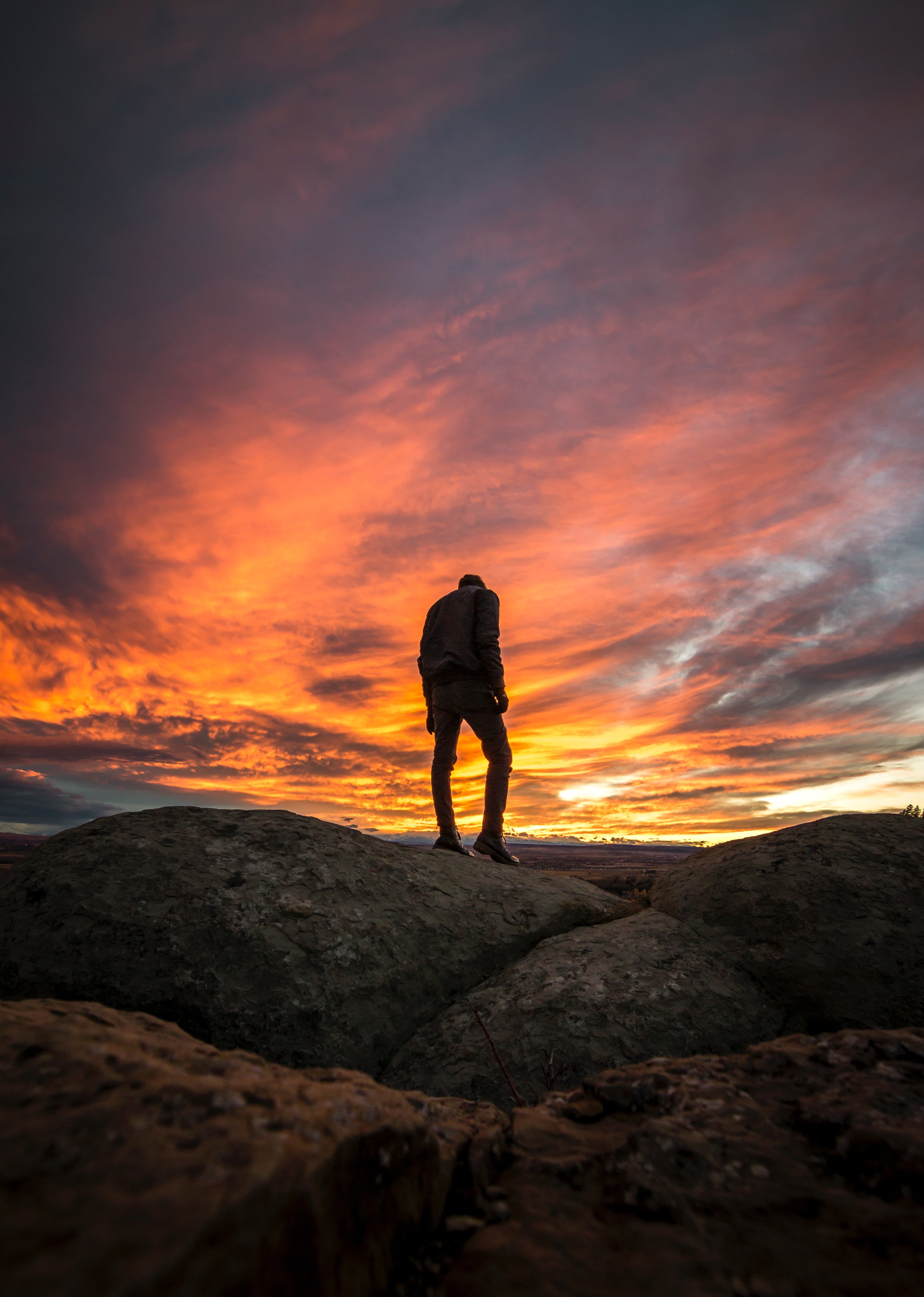 red, full length, leisure activity, beauty in nature, men, sunset, land, cloud - sky, sunlight, rock, business, lifestyles, scenics - nature, silhouette, Phone HD Wallpaper