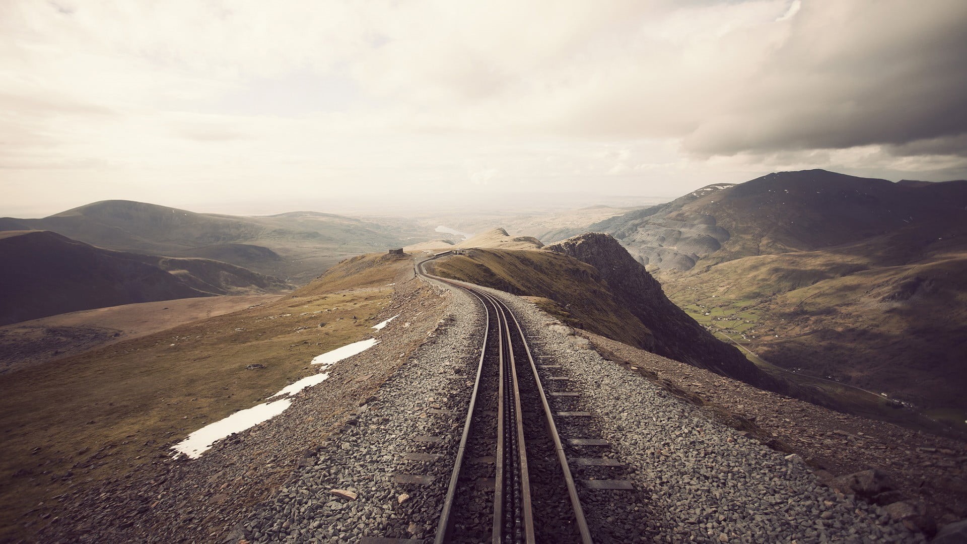 road, direction, no People, transportation, scenics, Snowdon, sunset, hill, gray, mountains, mountain range, travel, nature, sunlight, snow, tracks, environment, HD Wallpaper
