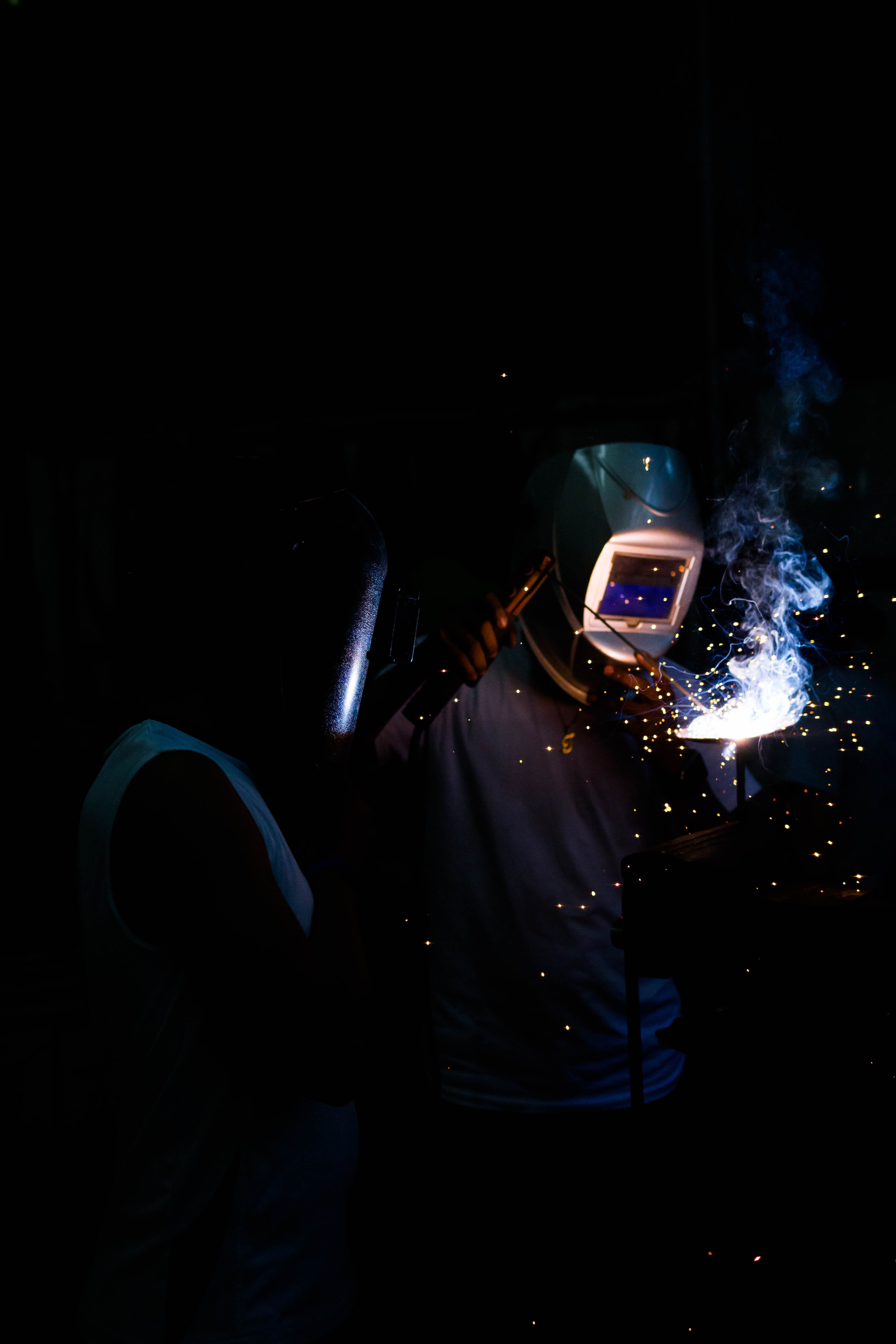 smoke, make, work, wearing, person, men, occupation, 5K, illuminated, indoors, fire, three quarter length, obscured face, black smith, arts culture and entertainment, Phone HD Wallpaper