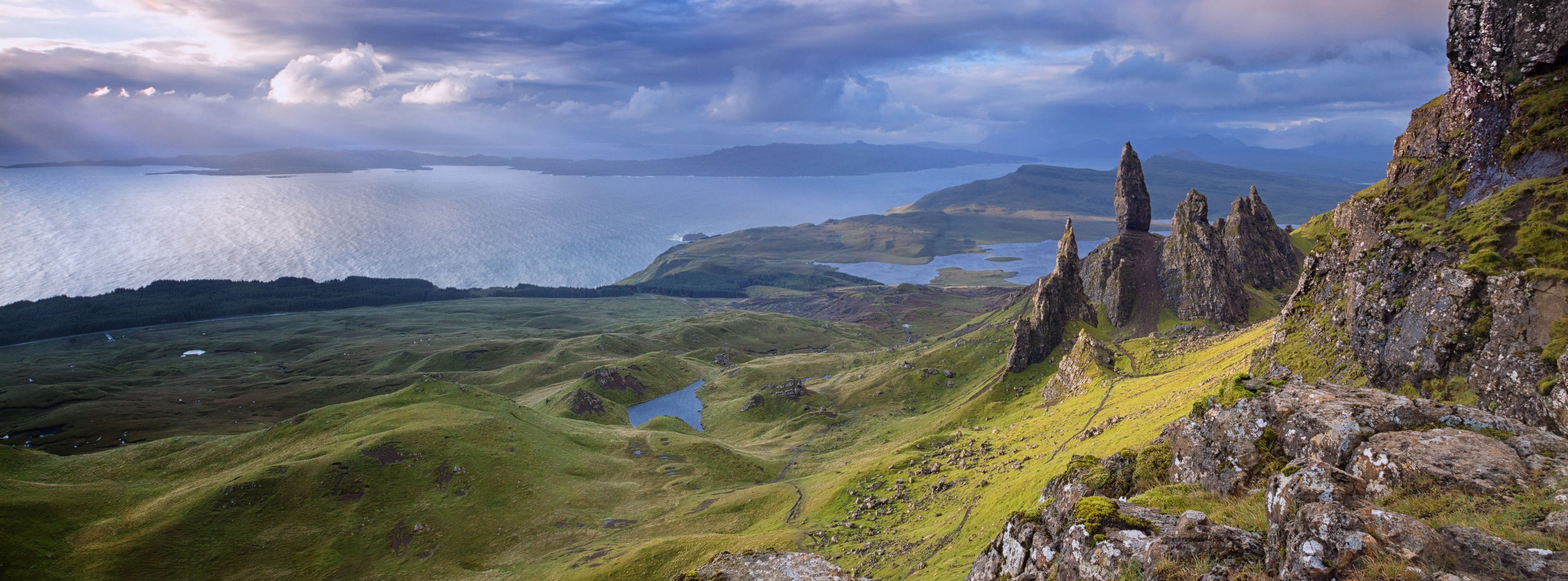 mountain, rock - object, outdoors, man, tranquility, Nature, cloud - sky, Skye, travel destinations, beauty in nature, thestorr, storr, ocean, sky, mountains, HD Wallpaper