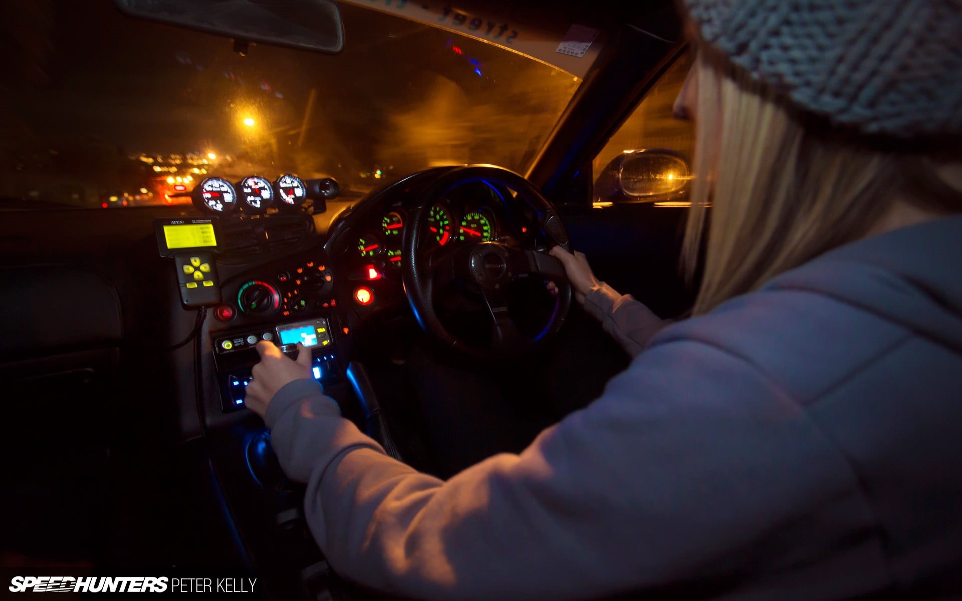 indoors, 1080P, woman, vehicle interior, vehicle, illuminated, control panel, technology, travel, adult, mode of transportation, holding, pilot, car interior, HD Wallpaper