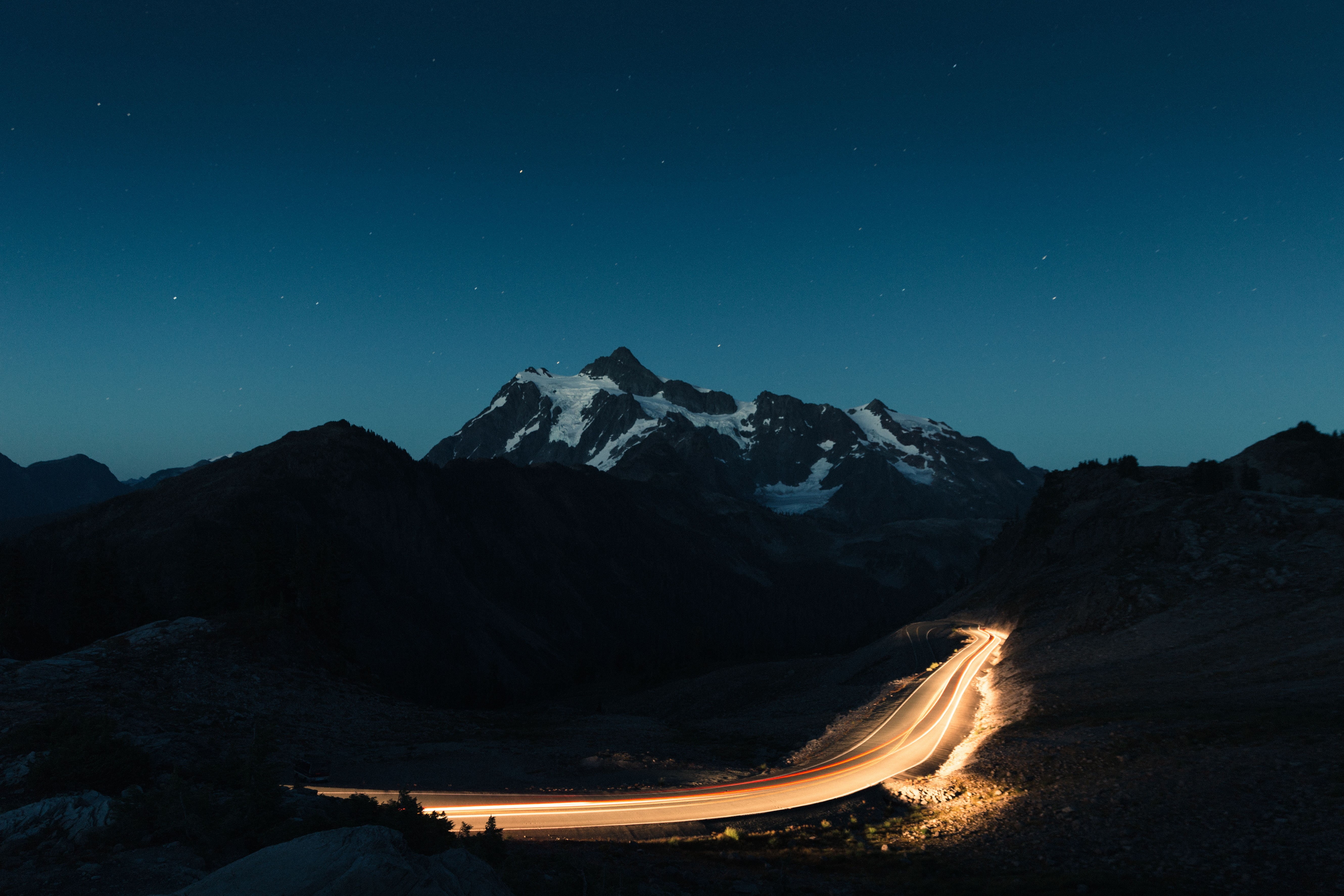 mountain, mountain peak, illuminated, snow, nature, sky, long exposure, landscape, blue, environment, star, astronomy, stars, tranquil scene, road, outdoors, HD Wallpaper