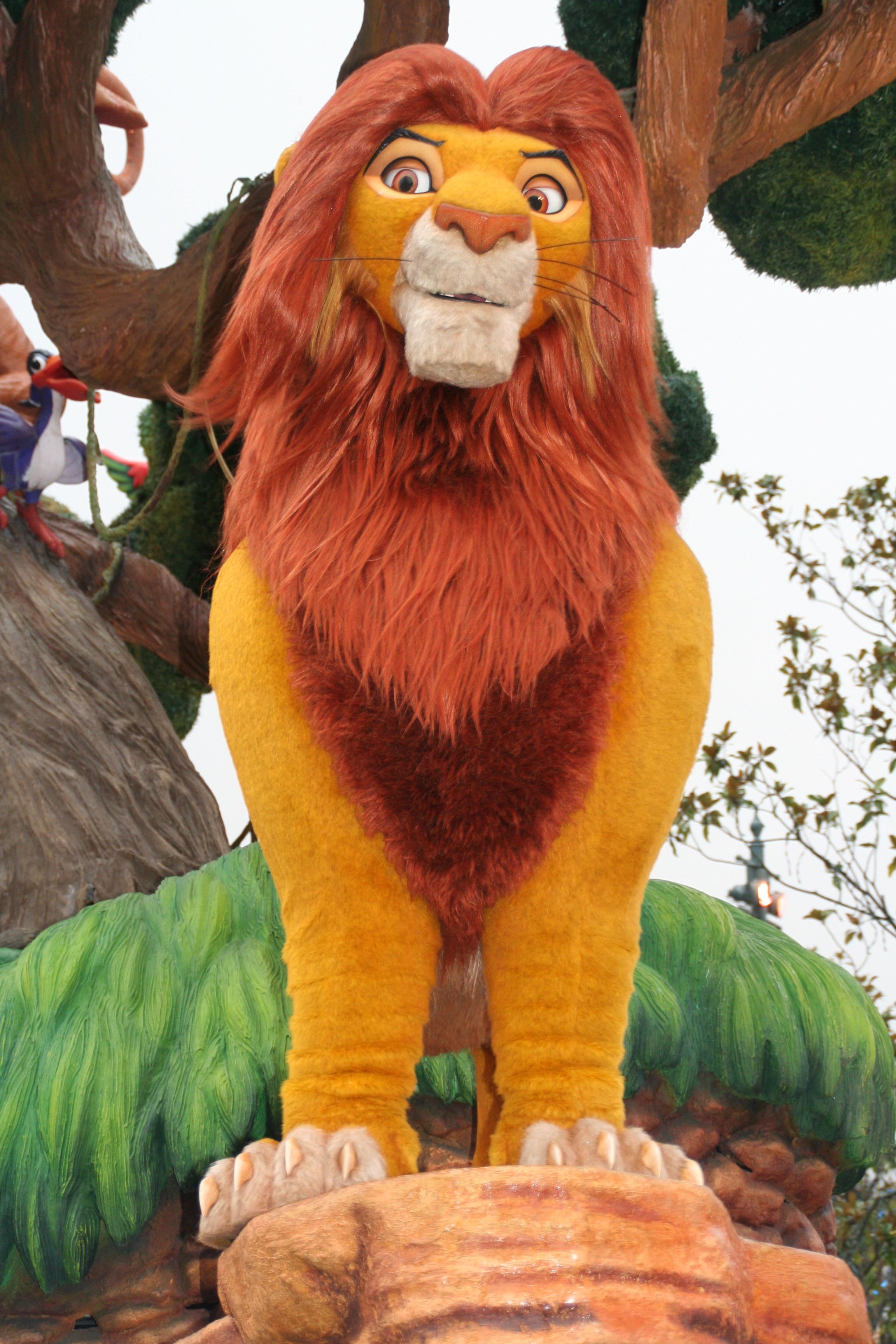day, animal representation, statue, animal themes, simba, sculpture, disneyland, park, tree, plant, animal wildlife, creativity, lion, character, lion king, Phone HD Wallpaper