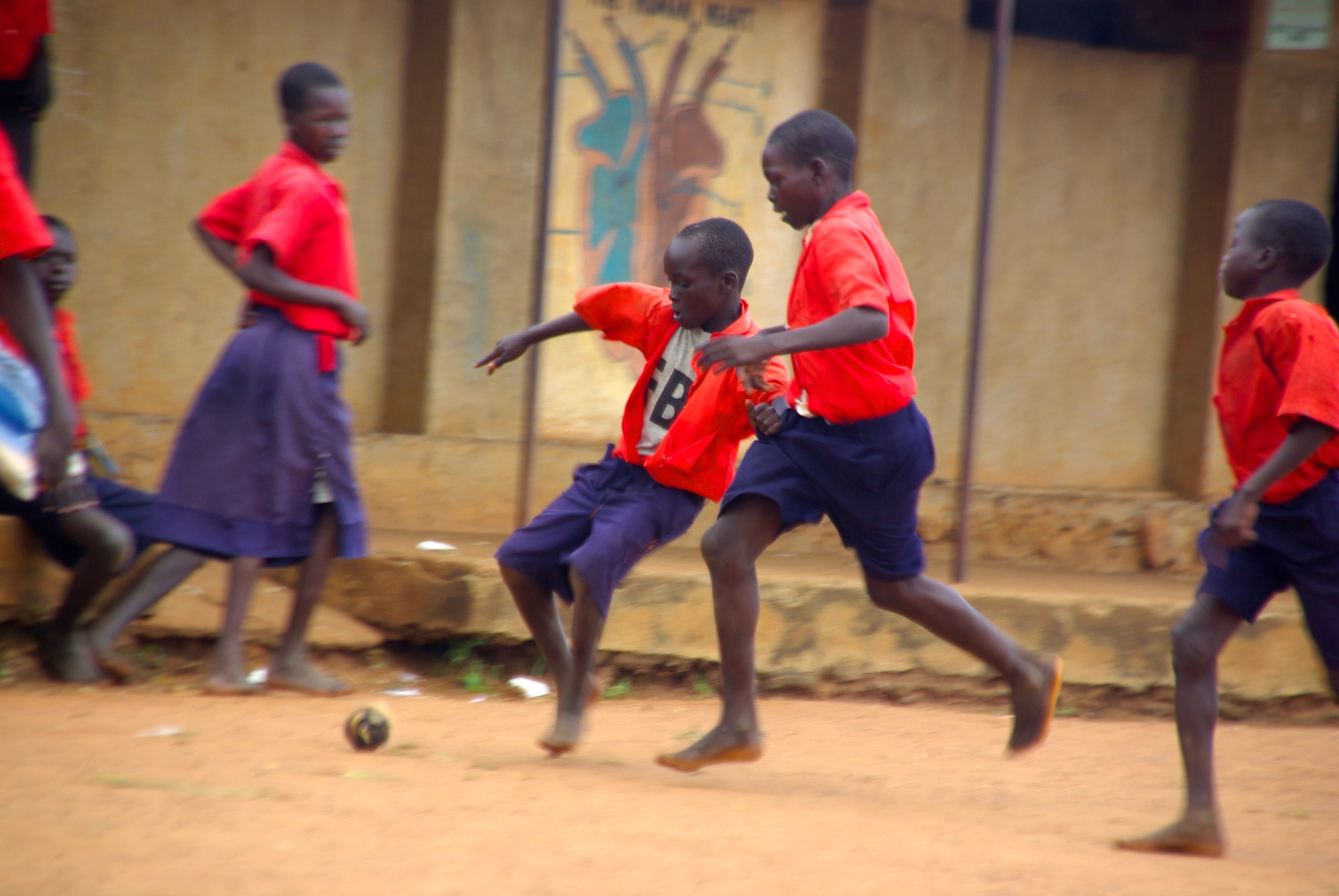 medium group of people, people, competition, boys, group of people, wall, goal, player, ball, motion, shorts, feet, day, dust, child, school, uniform, professional, HD Wallpaper