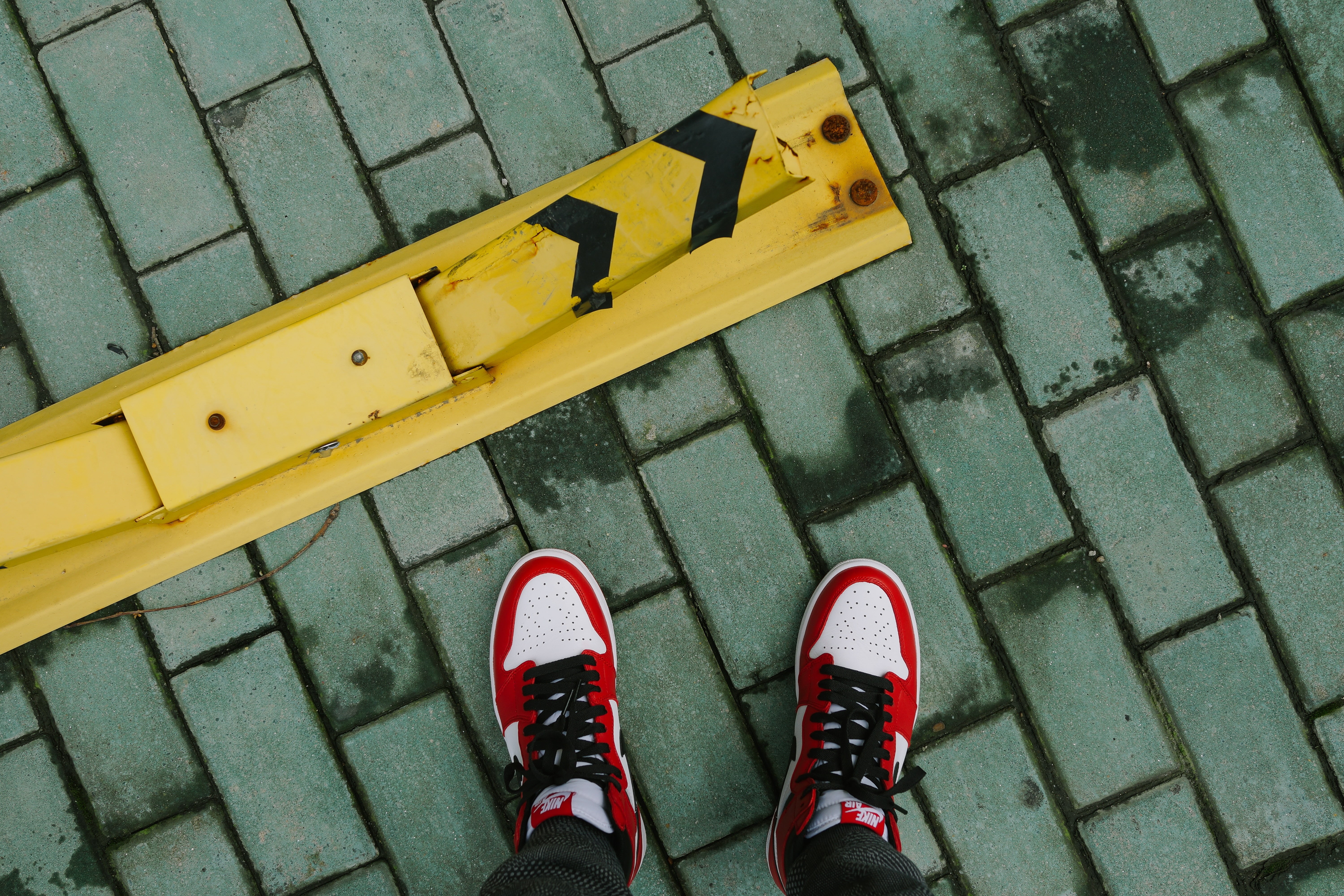 symbol, one person, real people, walking, day, outdoors, women, human body part, feet, tiles, lifestyles, human limb, people, 5K, jordan, street, paving stone, HD Wallpaper