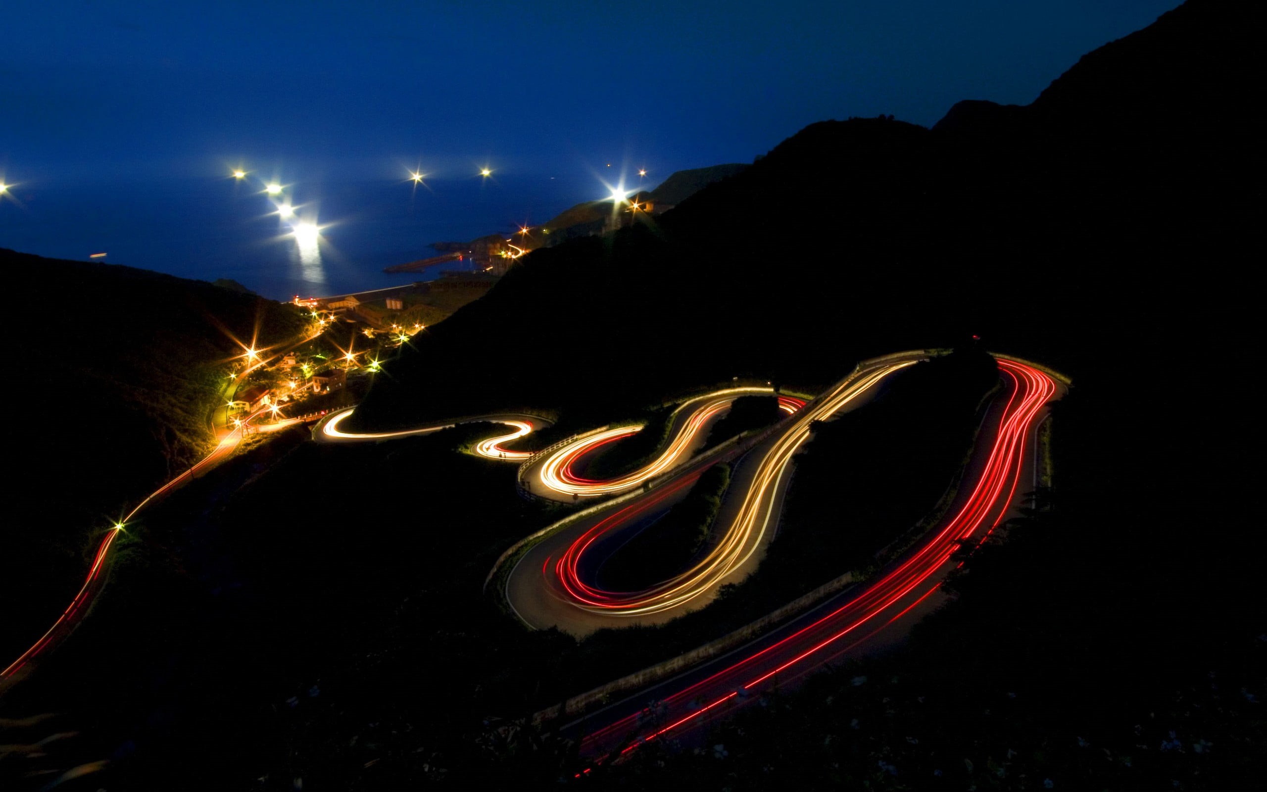 transportation, land, city, outdoors, lights, light trails, 2K, light - natural phenomenon, road, night, mountain, spiral, glowing, lapse, sky, motion, HD Wallpaper