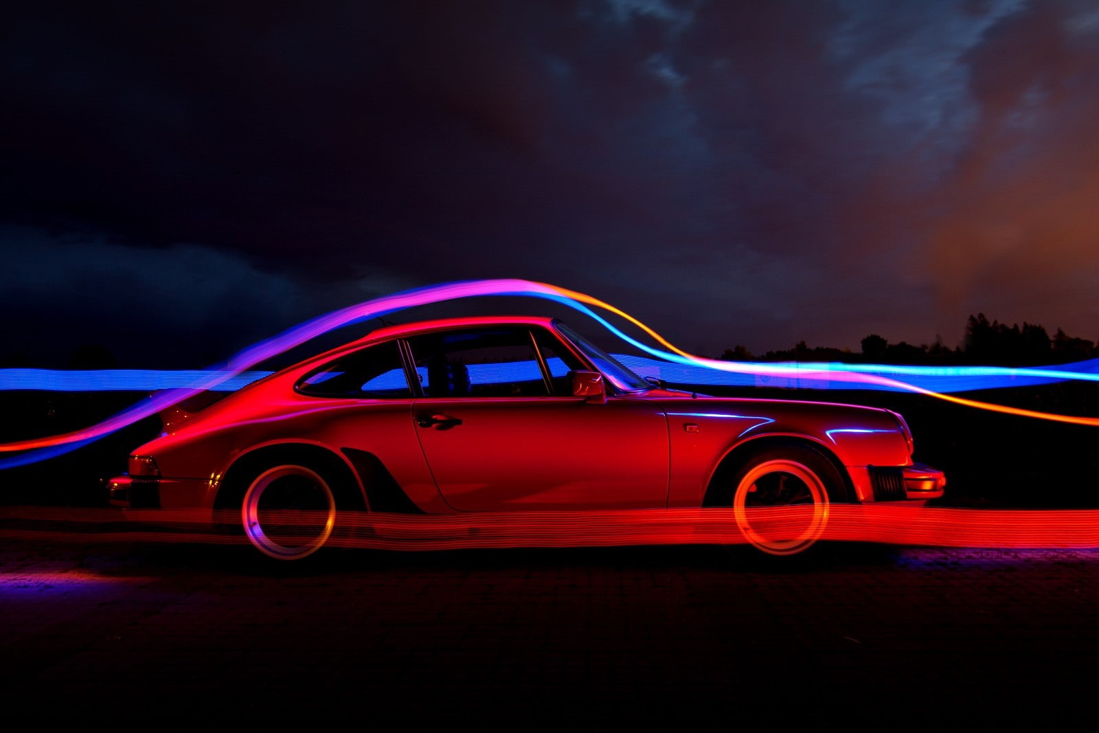 motion, motor vehicle, multi colored, transportation, red, mode of transportation, nature, light trails, sky, blurred motion, outdoors, cloud - sky, red cars, HD Wallpaper