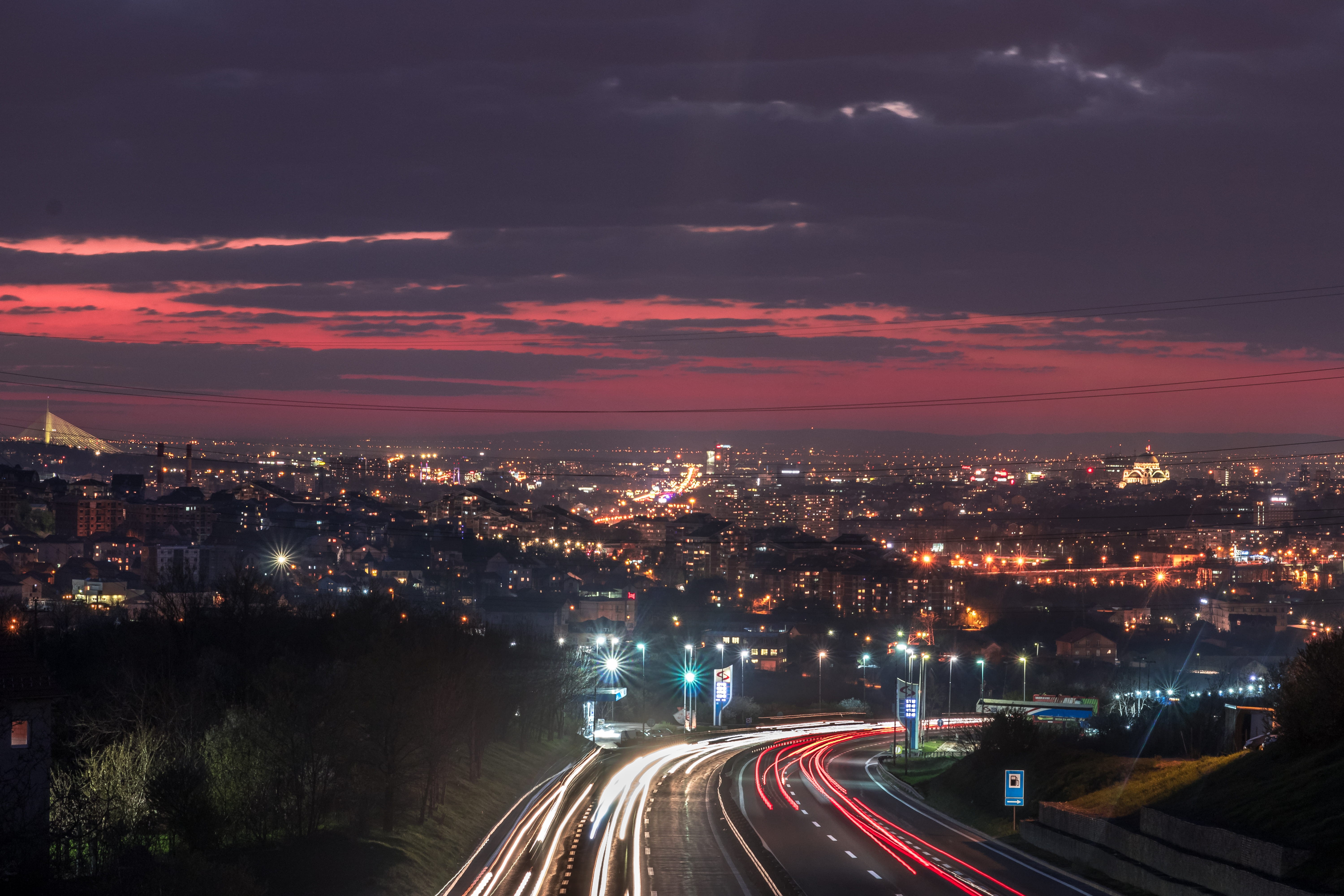 long exposure, clouds, motion, high angle shot, night, architecture, light, urban, cityscape, illuminated, speed, road, transportation system, buildings, HD Wallpaper