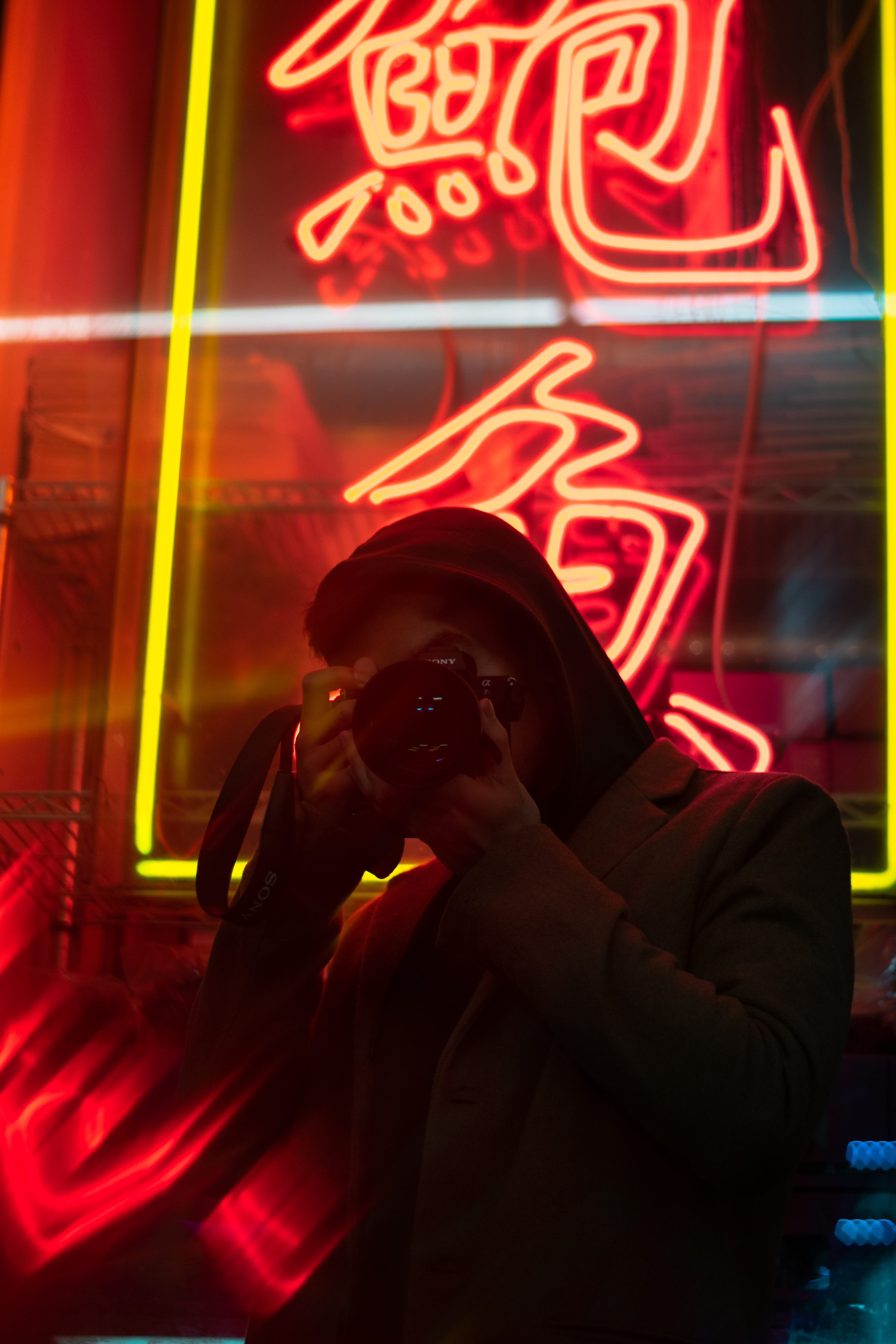 light, architecture, lens, red, night life, laser, front view, clothing, low angle view, text, human, men, mid adult, near, urban, holding, 5K, person, Phone HD Wallpaper