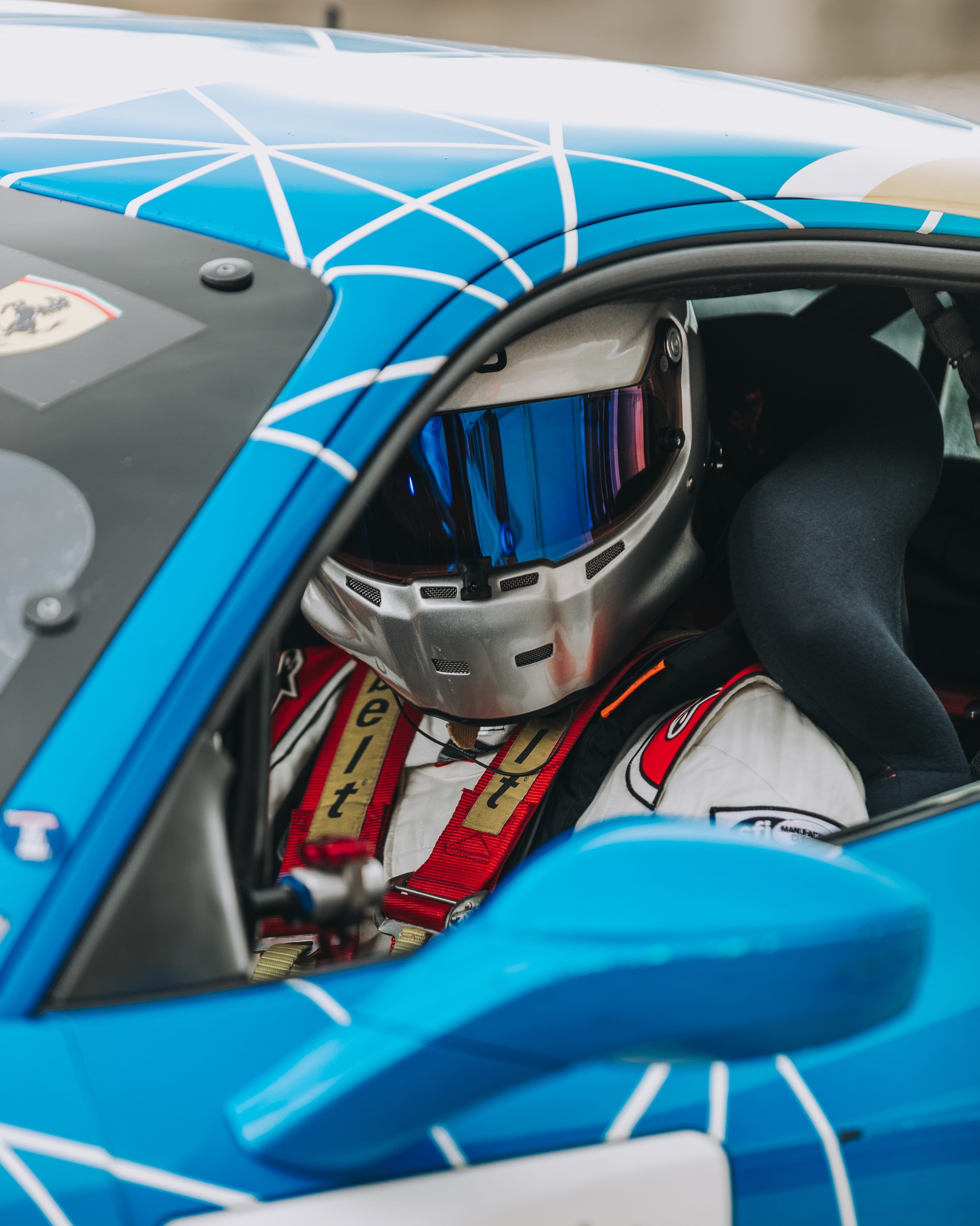 motor, car interior, human, day, car, steering wheel, machine, race, vehicle, sport, vehicle interior, wearing, glass - material, mode of transportation, Phone HD Wallpaper