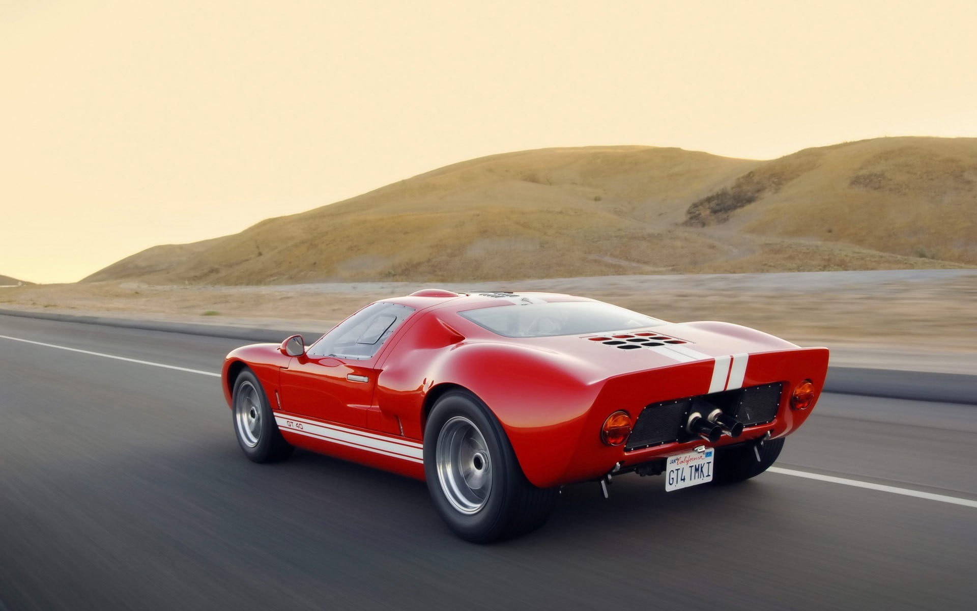 car, white, road, model, day, mode of transportation, land vehicle, Ford, motion, symbol, wheel, environment, transportation, sky, nature, red, cast, road trip, HD Wallpaper