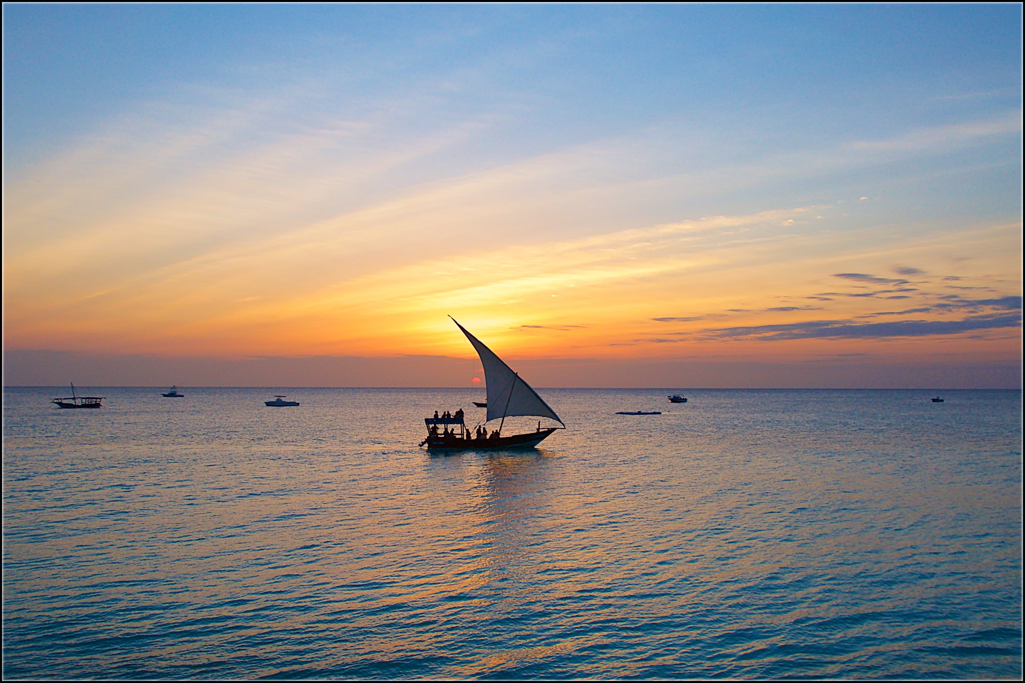 body, nature, sea, zanzibar, sailboat, tranquility, tranquil scene, sunset, mode of transportation, horizon, horizon over water, sail, cloud - sky, sailing, HD Wallpaper