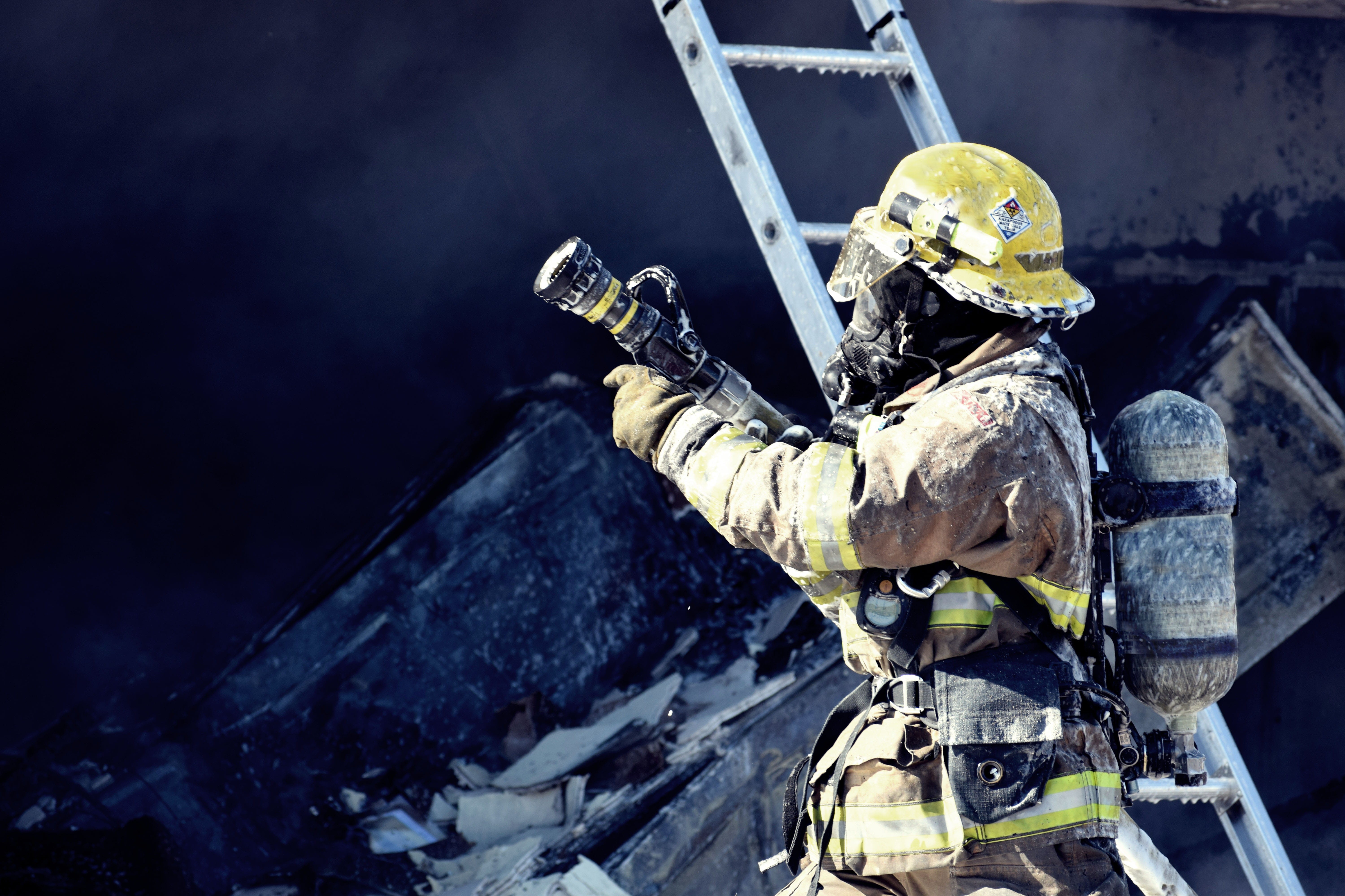 uniform, danger, firefighter, job, man, clothing, service, outdoors, equipment, industry, holding, accidents and disasters, male likeness, nature, person, HD Wallpaper