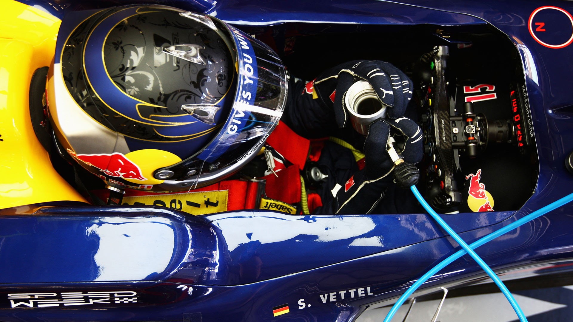 Red Bull Racing, shiny, mode of transportation, gloves, communication, metal, Formula 1, engine, multi colored, motorsport, day, full frame, helmet, auto racing, HD Wallpaper