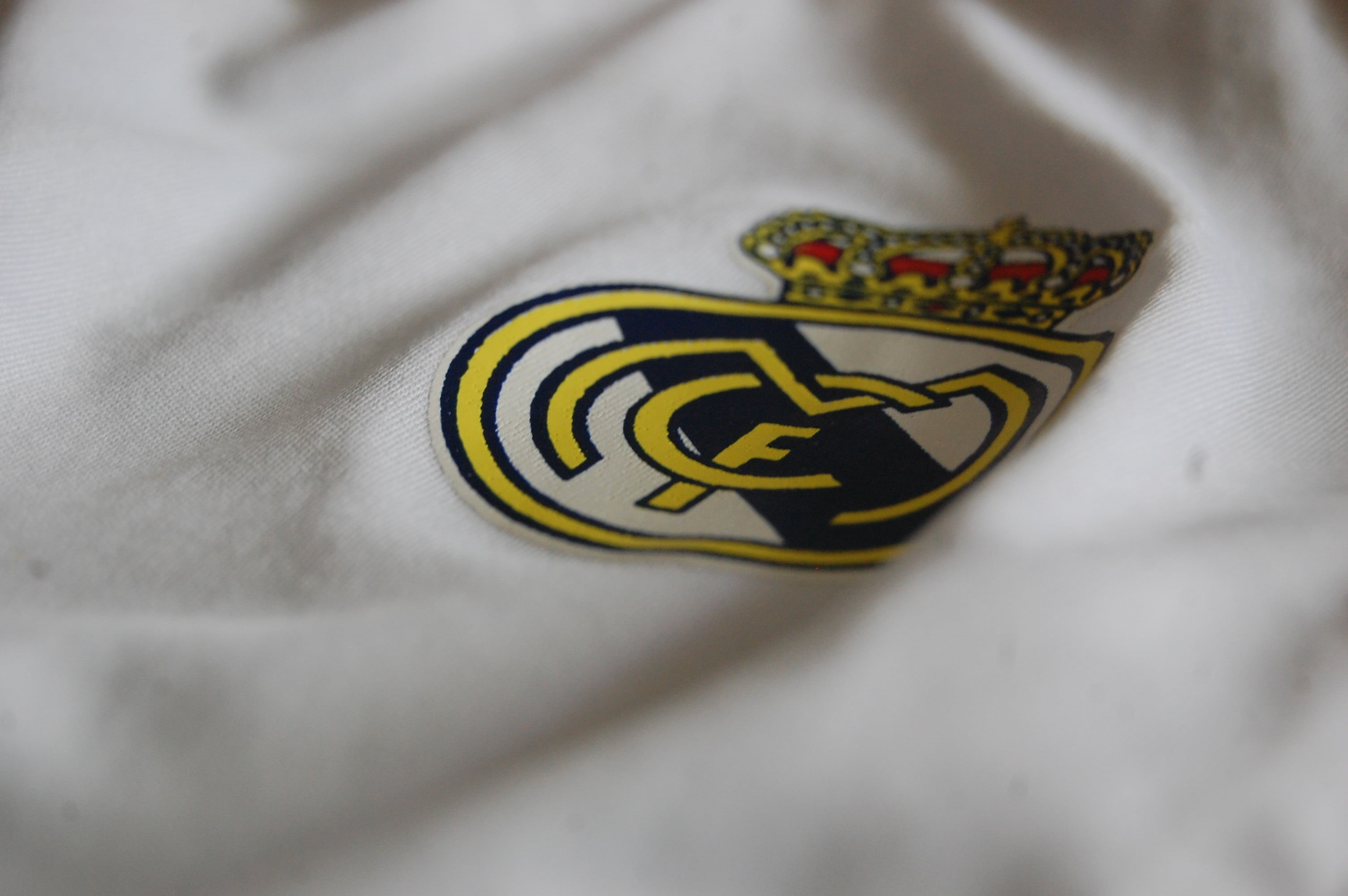 textile, selective focus, black, logo, creativity, soccer, Real Madrid, male likeness, high angle view, art and craft, clothe, still life, representation, HD Wallpaper