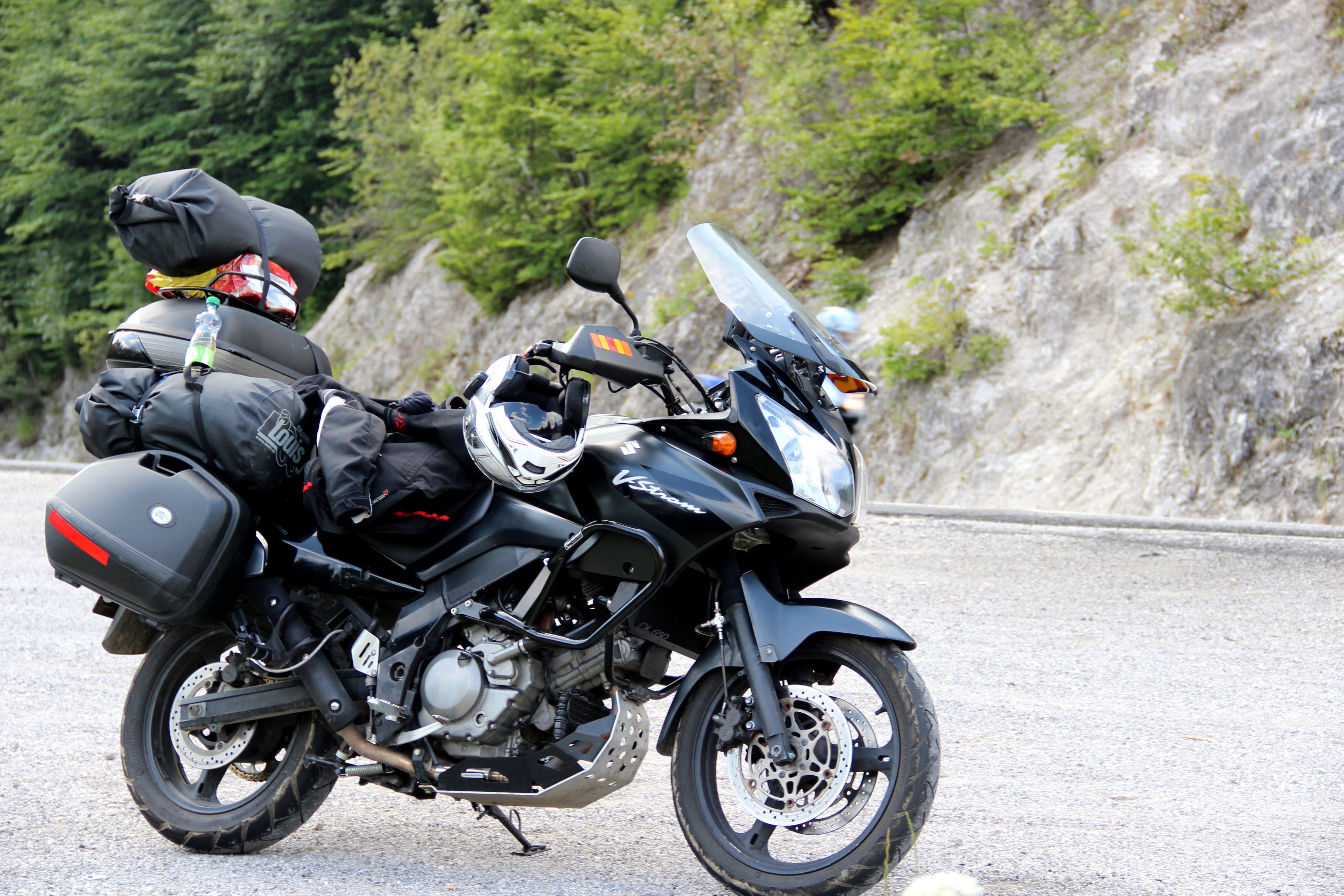one person, motion, biker, road, leather, holidays, outdoors, mode of transportation, pause, black, crash helmet, travel, sports equipment, 5K, sport, HD Wallpaper