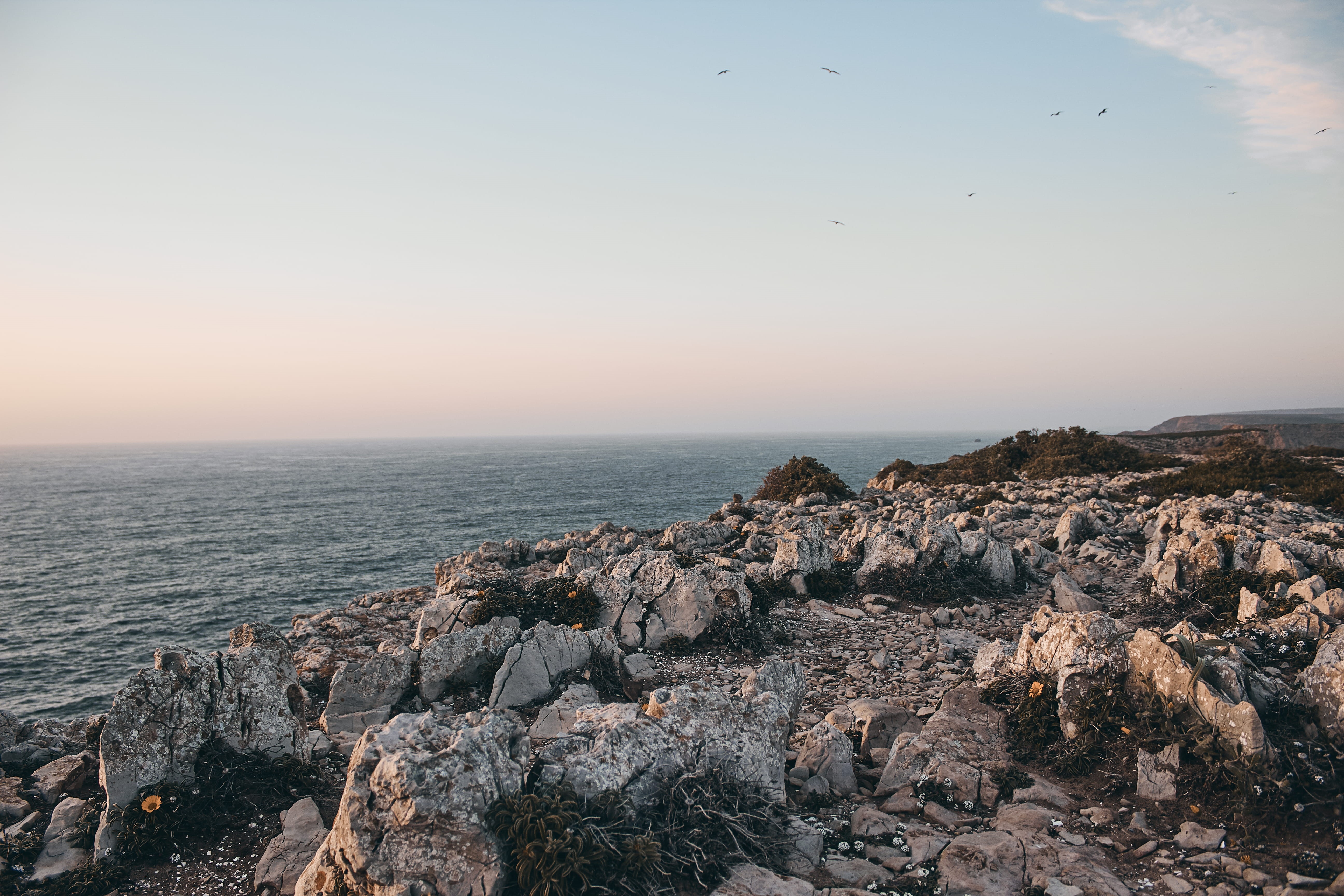 tower, water, stones, sea, adventure, lighthouse, goldenhour, rock - object, tranquility, architecture, rocky coastline, nature, endoftheworld, 5K, building, HD Wallpaper