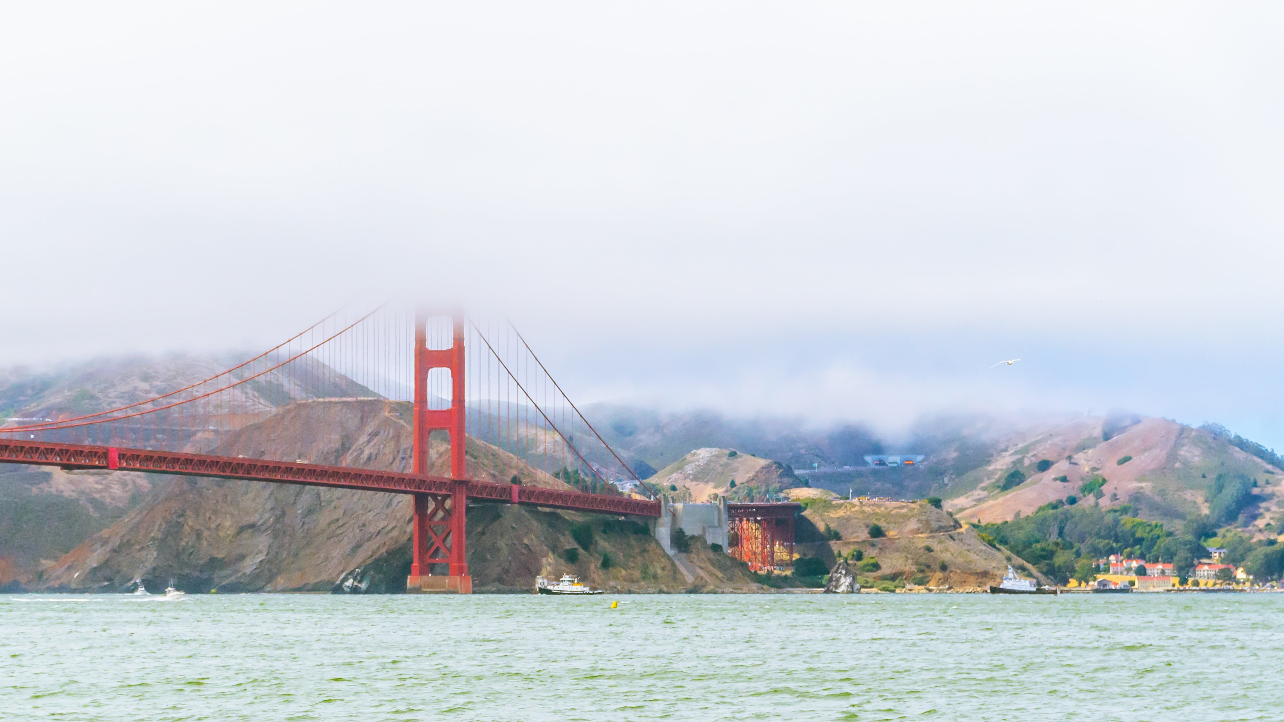 clouds, no people, river, structure, 4K, tourism, water, travel destinations, fog, bridge, highland, mountain, bay, architecture, ocean, blue, building exterior, HD Wallpaper