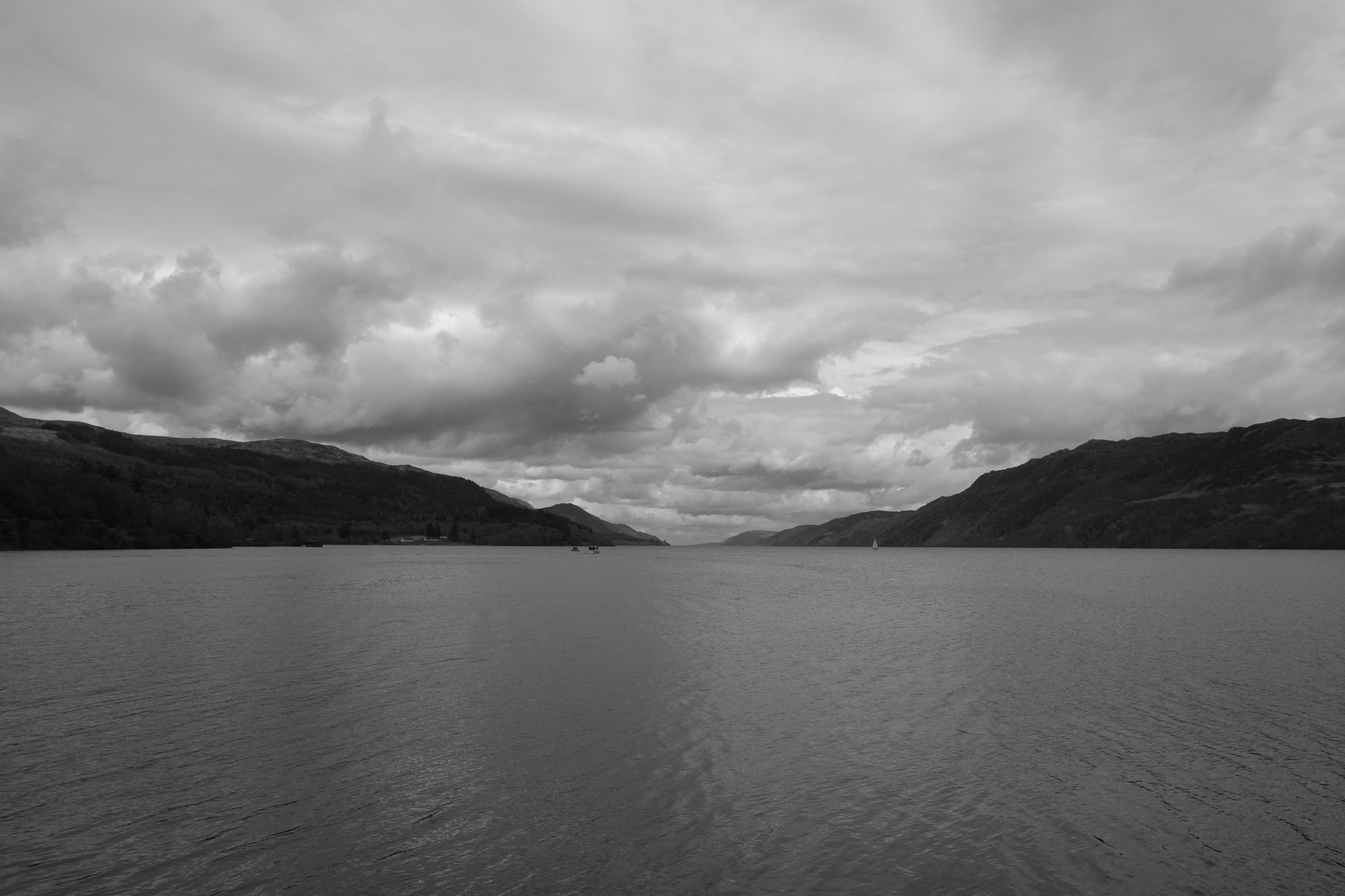 beauty in nature, loch ness, cloud - sky, outdoors, day, tranquility, non-urban scene, environment, hole, water, mountain, waterfront, black and white, HD Wallpaper