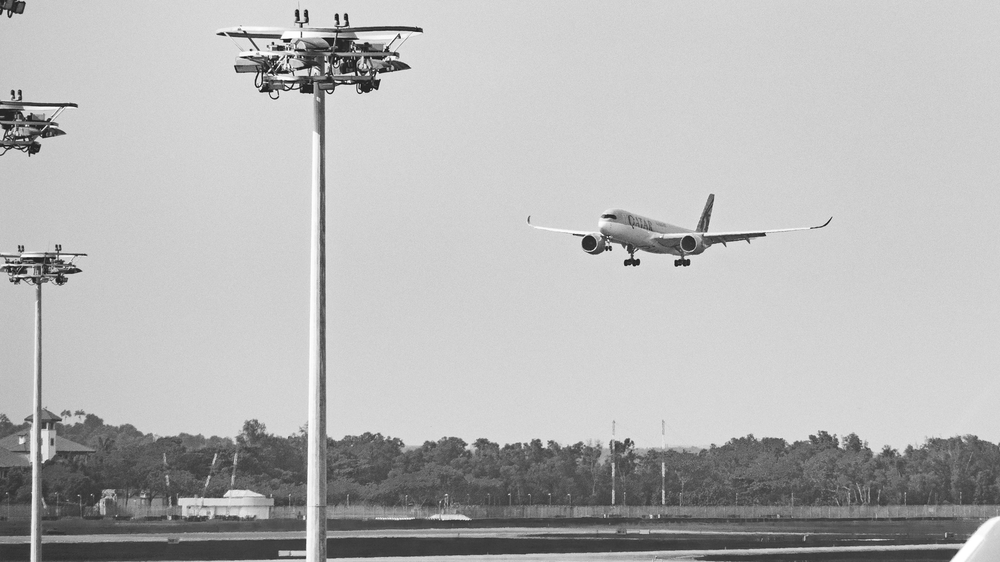 2K, flying, grayscale, airliner, transportation, airbus, travel, airport runway, photo, forest, nature, tree, motion, landing - touching down, no people, HD Wallpaper