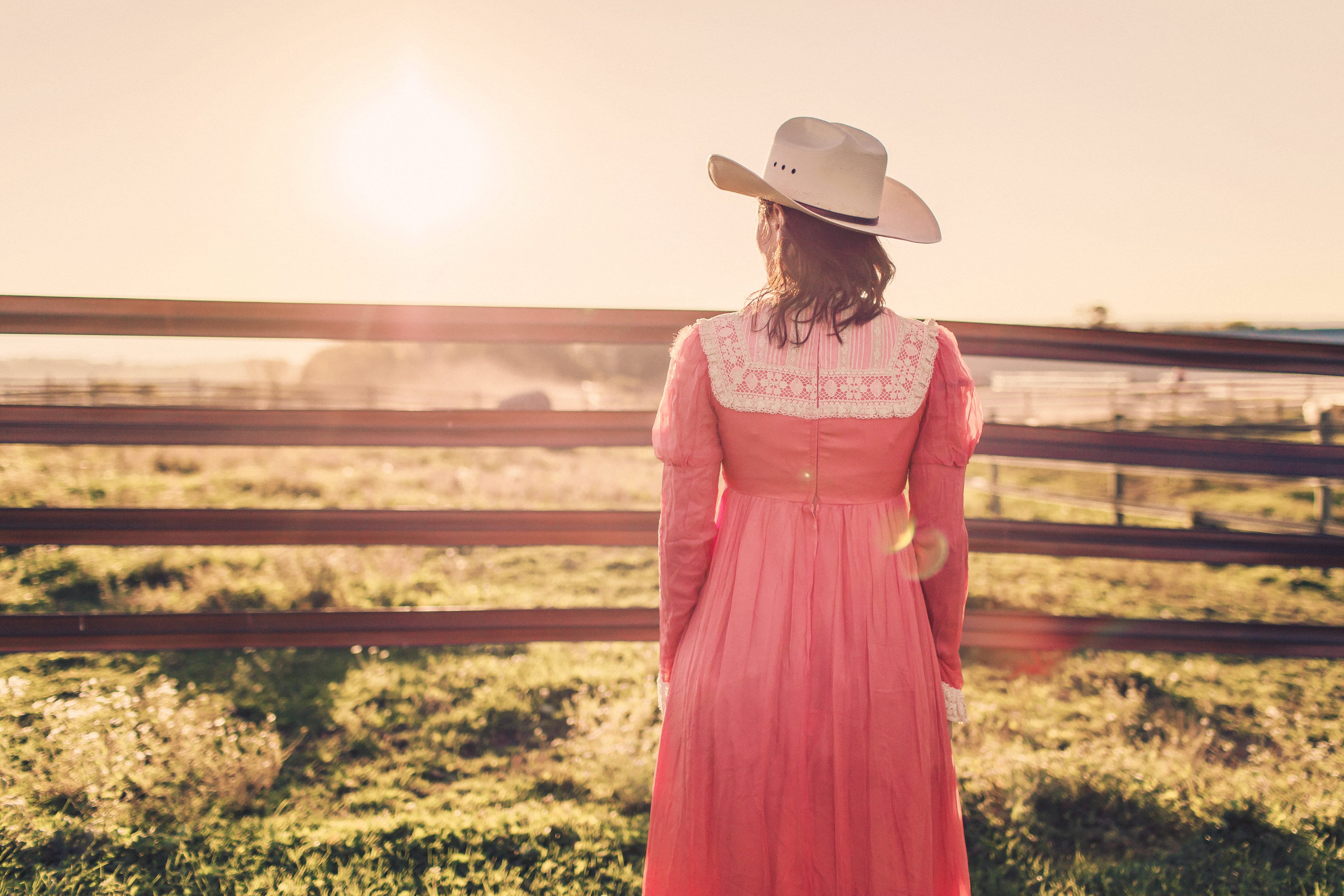 sunlight, photography, white hat, lens flare, lifestyles, dress, sunset, farm, clothing, hat, 4K, pink color, woman, green grass, adult, lazy, beauty In Nature, HD Wallpaper