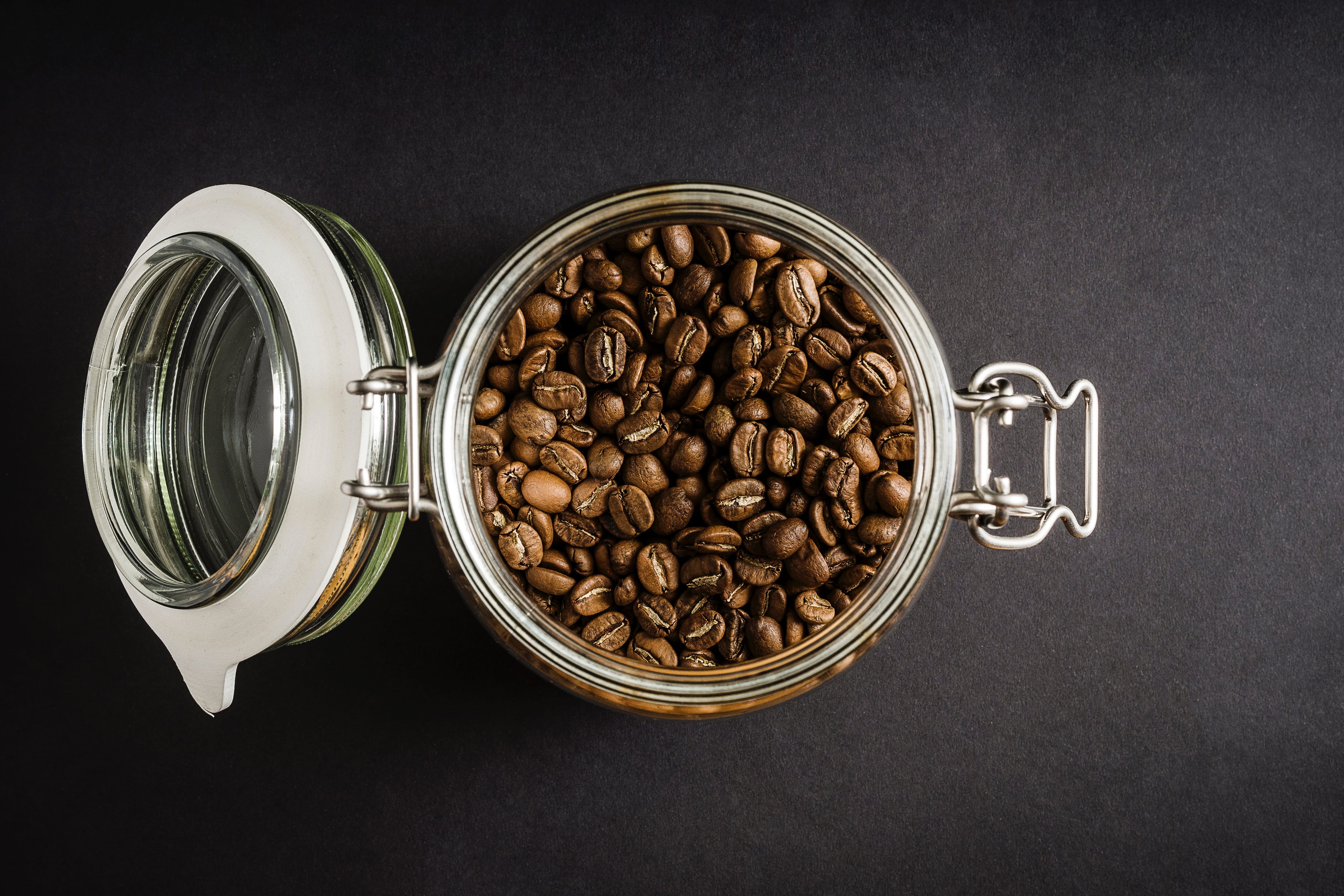 cafe, close-up, jar, coffee, food and drink, bean, brown, refreshment, directly above, 4K, indoors, beans, no People, still life, studio shot, food, black background, HD Wallpaper