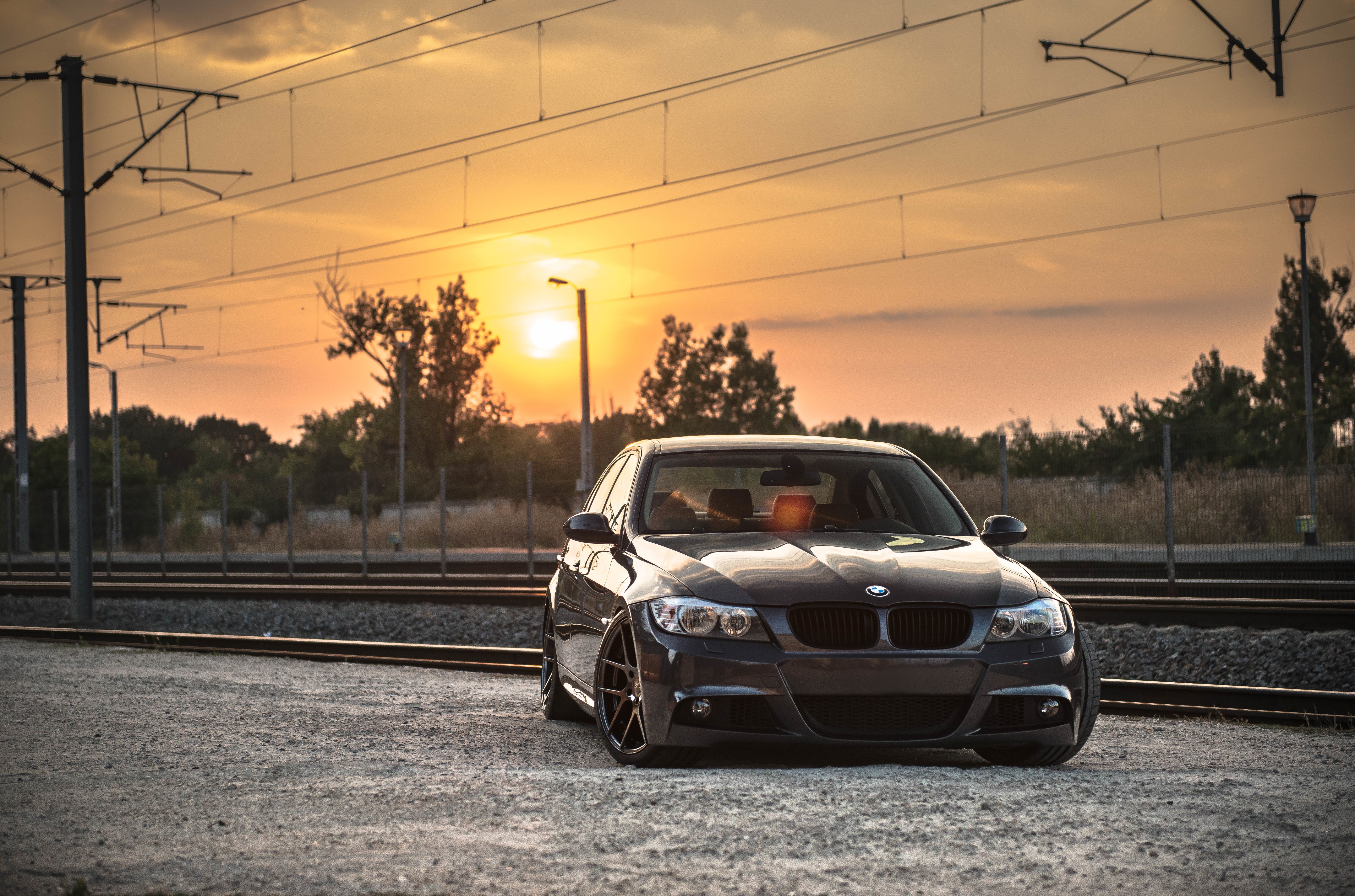 Deep Concave, mode of Transport, orange color, power line, mini Cooper, compact Car, E90, bumper, series, lens flare, reflection, tree, urban Scene, classic, HD Wallpaper