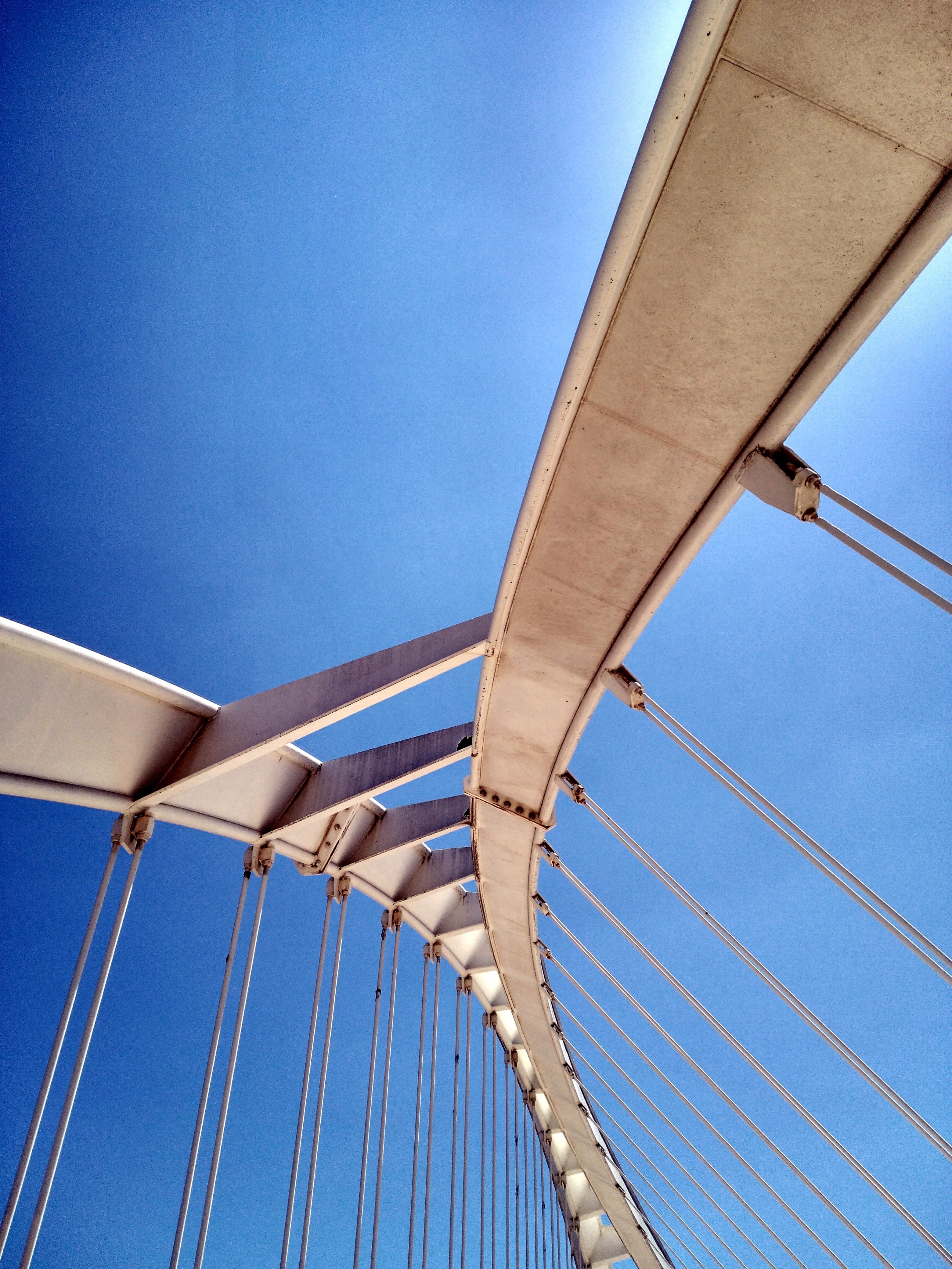 sunlight, rope, construction, business, bridge, barcelona, engineering, day, road, connection, sailboat, path, architecture, sport, blue, polygons, suspension bridge, Phone HD Wallpaper