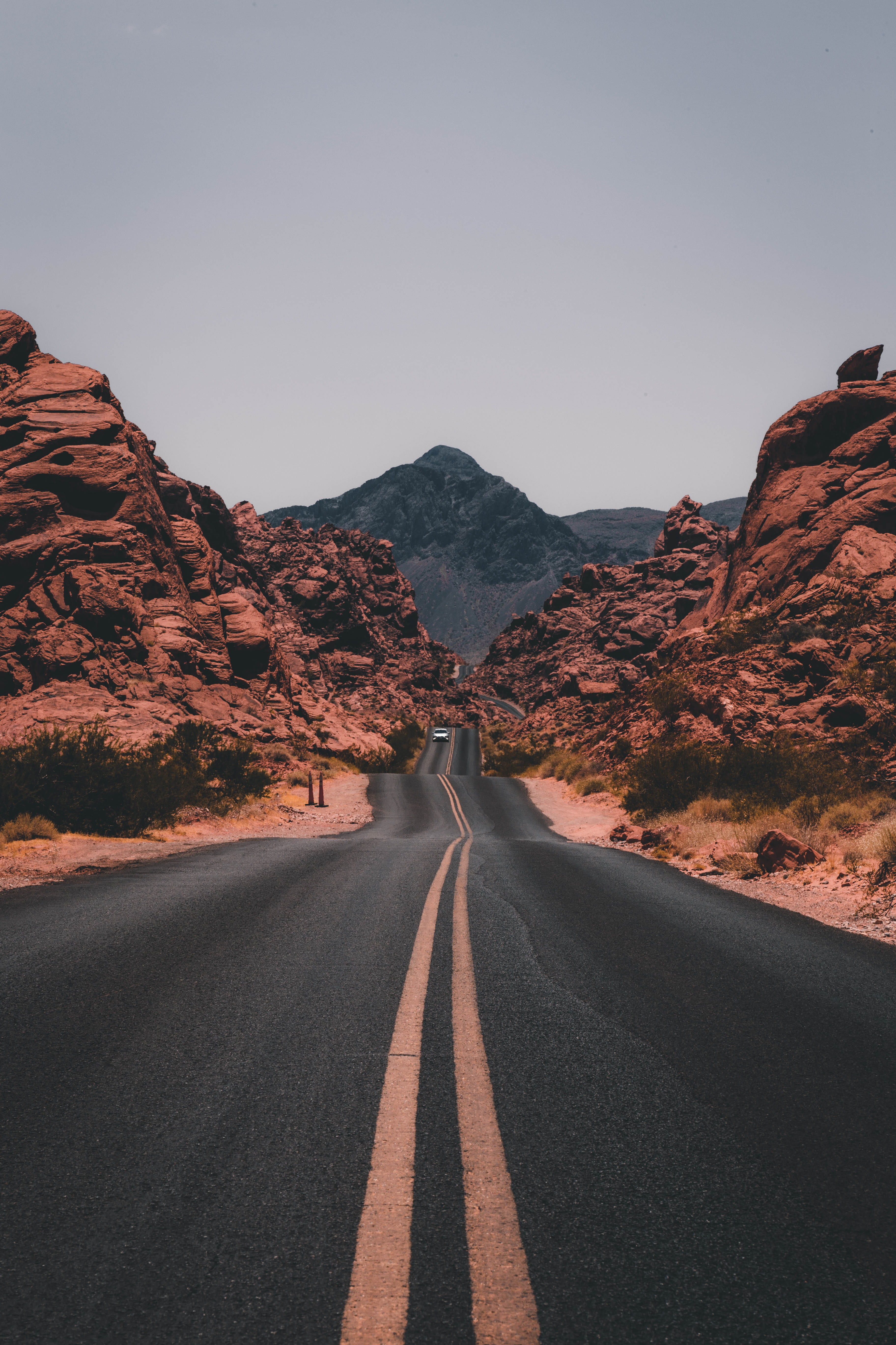 road marking, cliff, valley, beauty in nature, brown, black, non-urban scene, clear sky, dividing line, iphone, mountain, scene, transportation, Phone HD Wallpaper