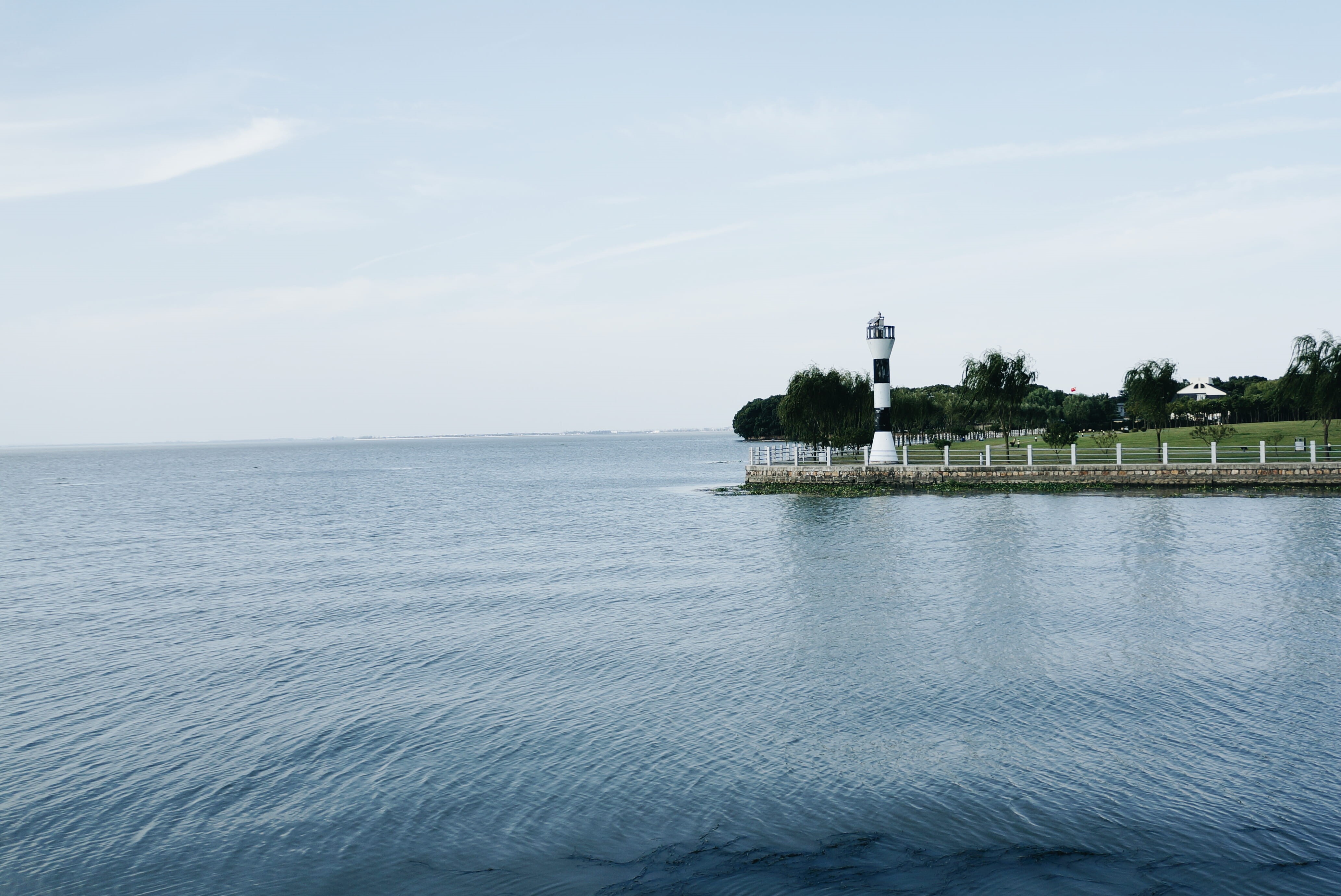 water, blue, day, outdoors, beauty in nature, time, house, white, on the edge, light, horizon, point, coast, island, body, building, tranquil scene, sea, HD Wallpaper